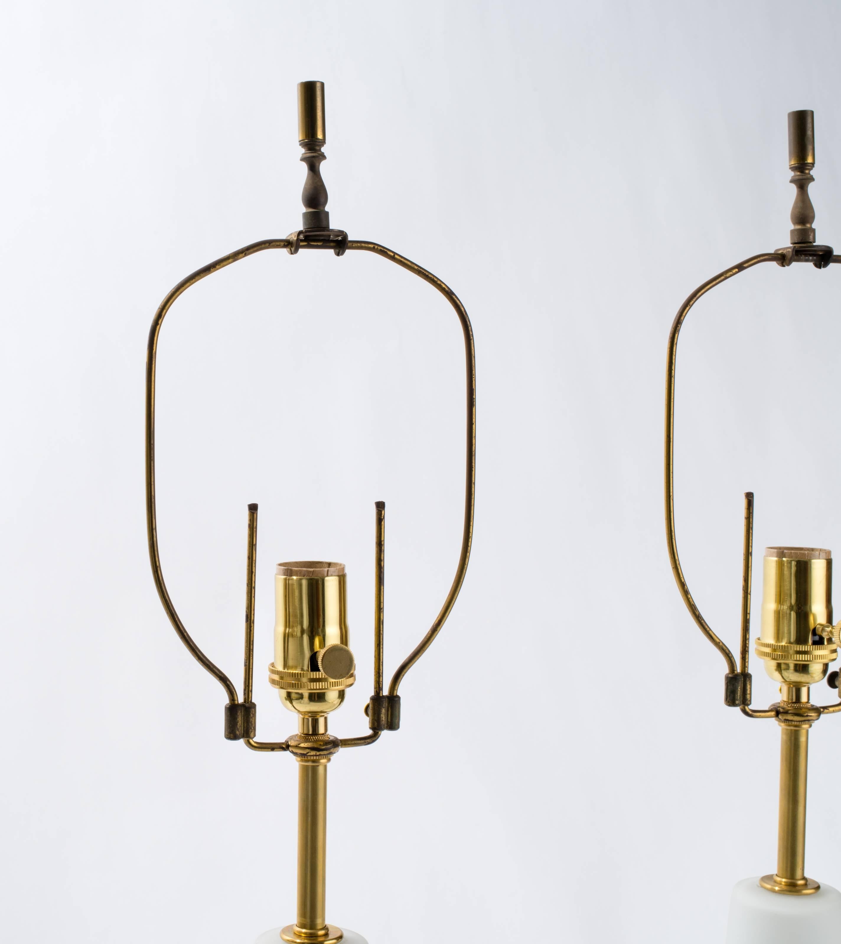 1950s blown glass and wood base table lamps.
Newly rewired with brass sockets. Original adjustable harp.