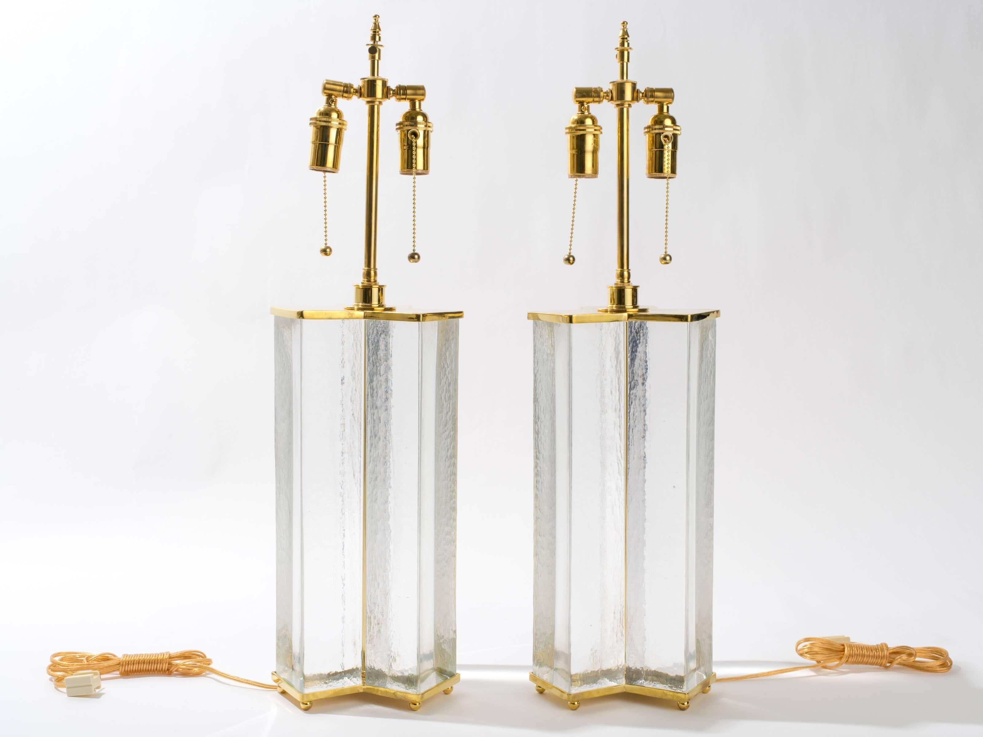 Solid clear glass and brass table lamps.
Double pull chain sockets with adjustable height.