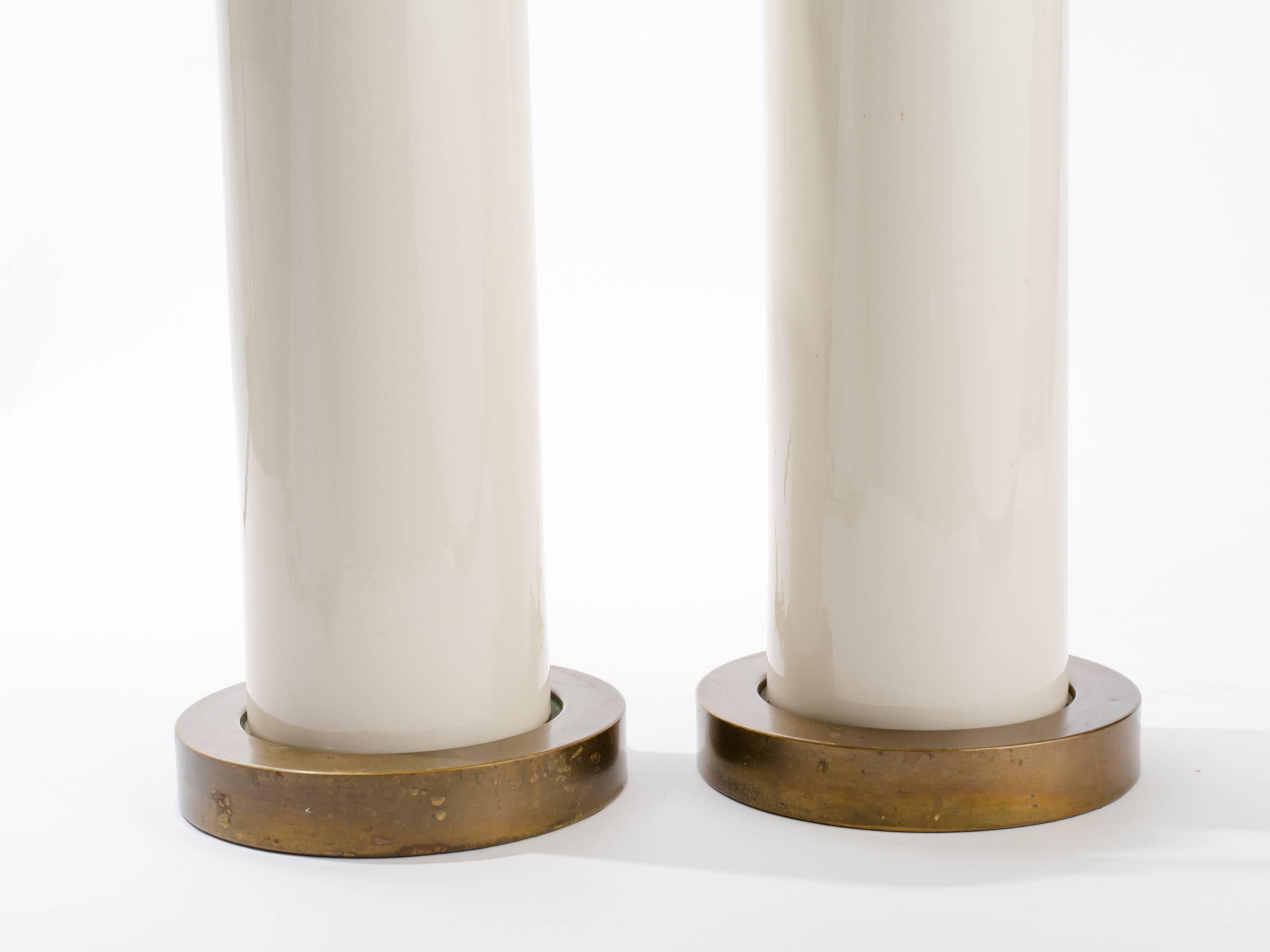 Pair of American cylindrical lamps with brass bases.
Rewired.