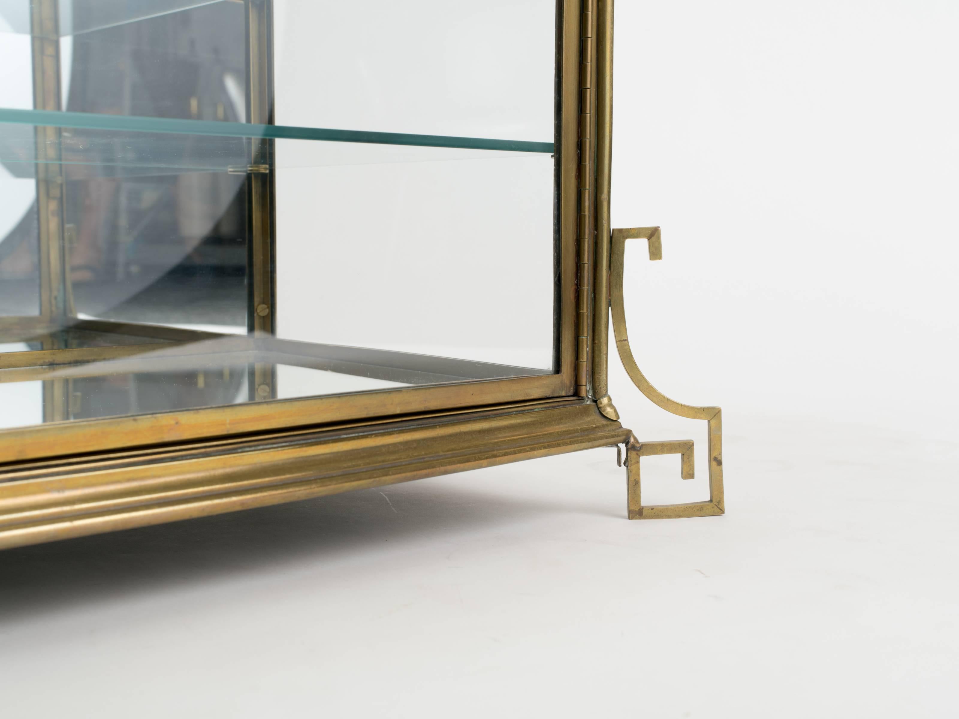 brass curio cabinet