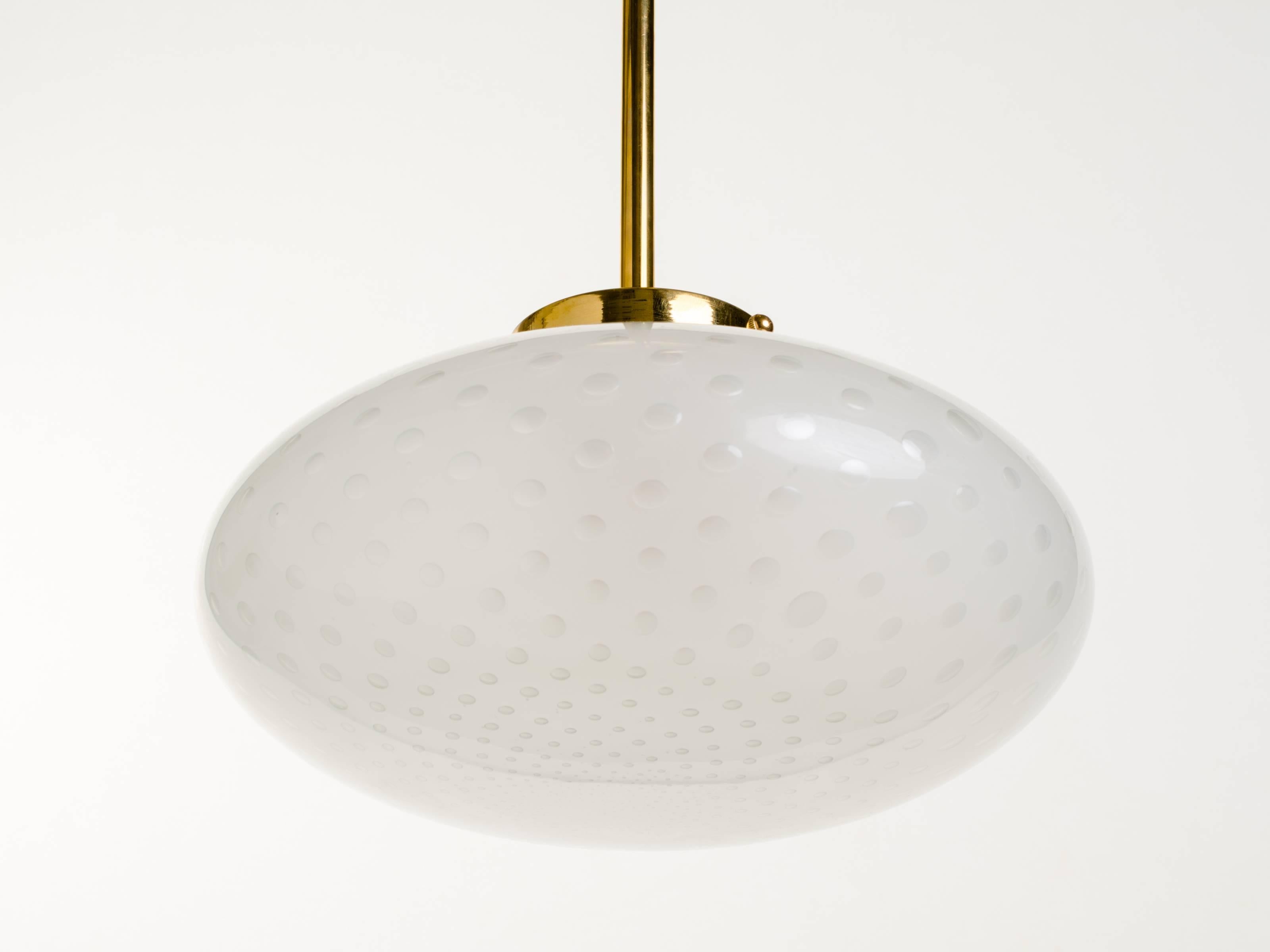 Handblown glass with controlled air bubble inclusions.
Brass hardware.
Multiple available.