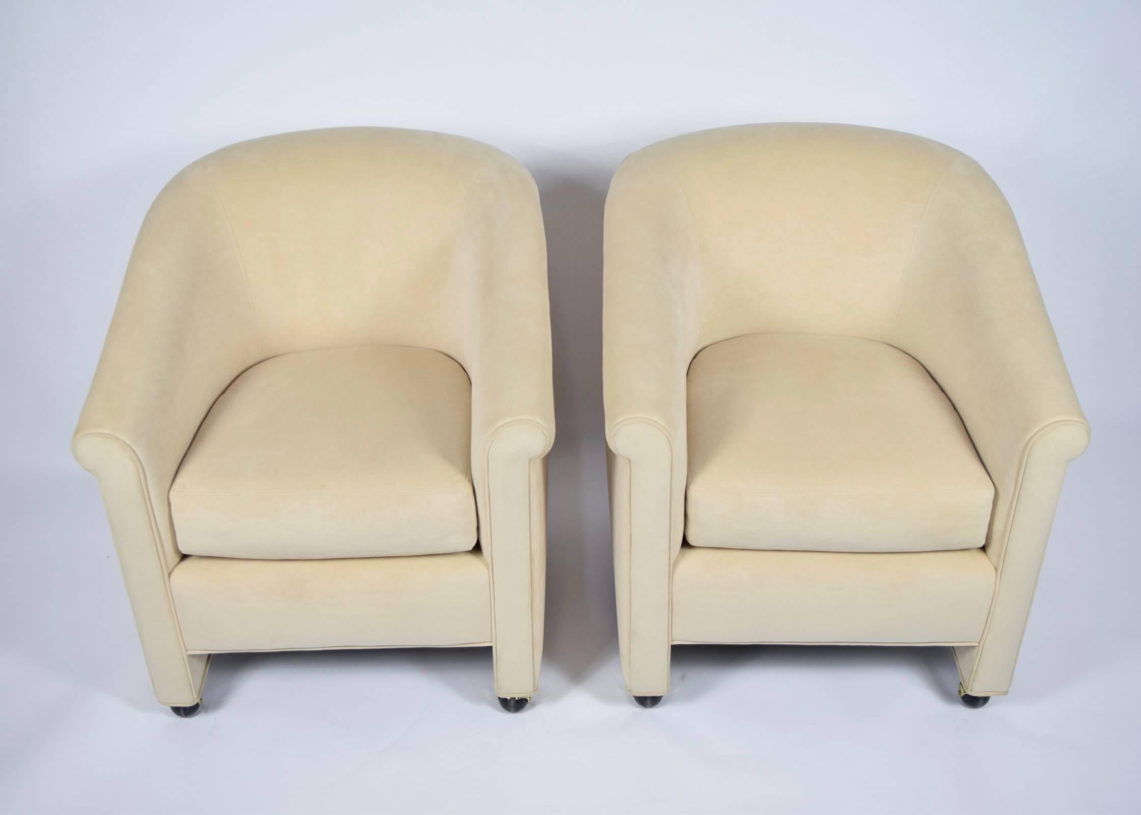 A really nice pair of club chairs by A. Rudin. Fabric appears to be a suede and is in really nice condition so if color works, no reupholstery is necessary. Chairs are on casters.