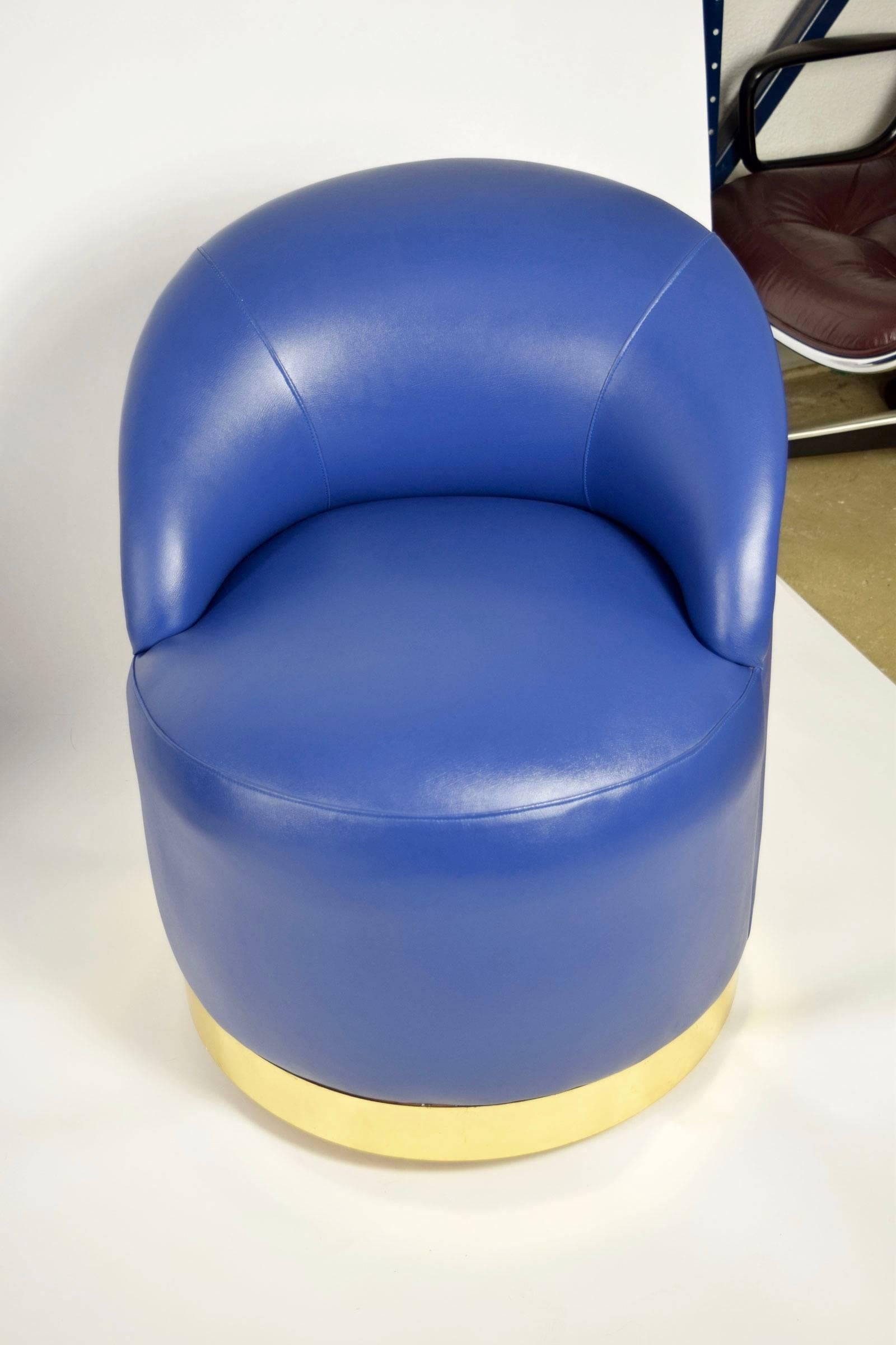 Contemporary Karl Springer Style Chairs in Blue Leather with Brass Finish Base on Casters