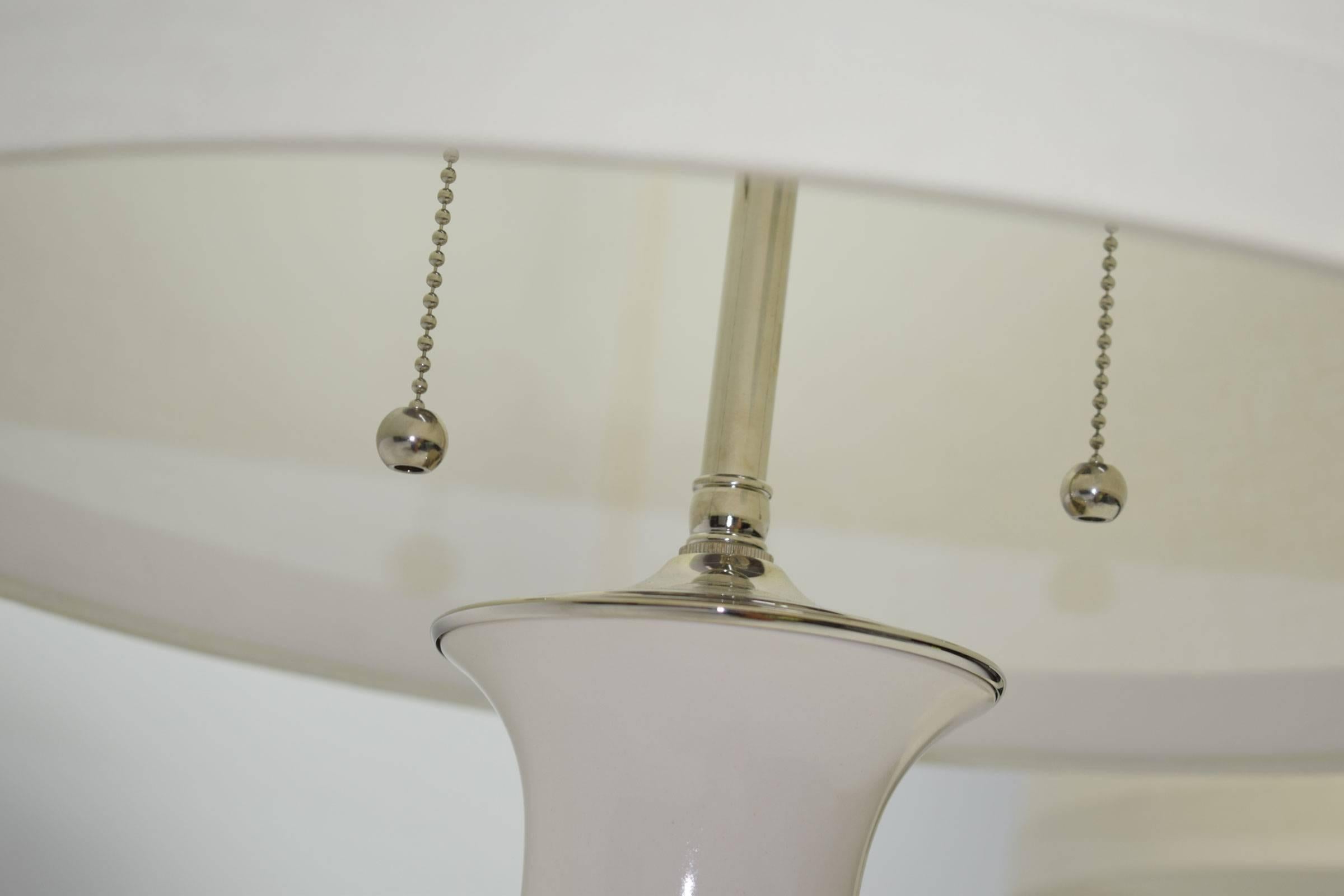 Pair of Christopher Spitzmiller Lamps in White with Silver Leaf Bases 1