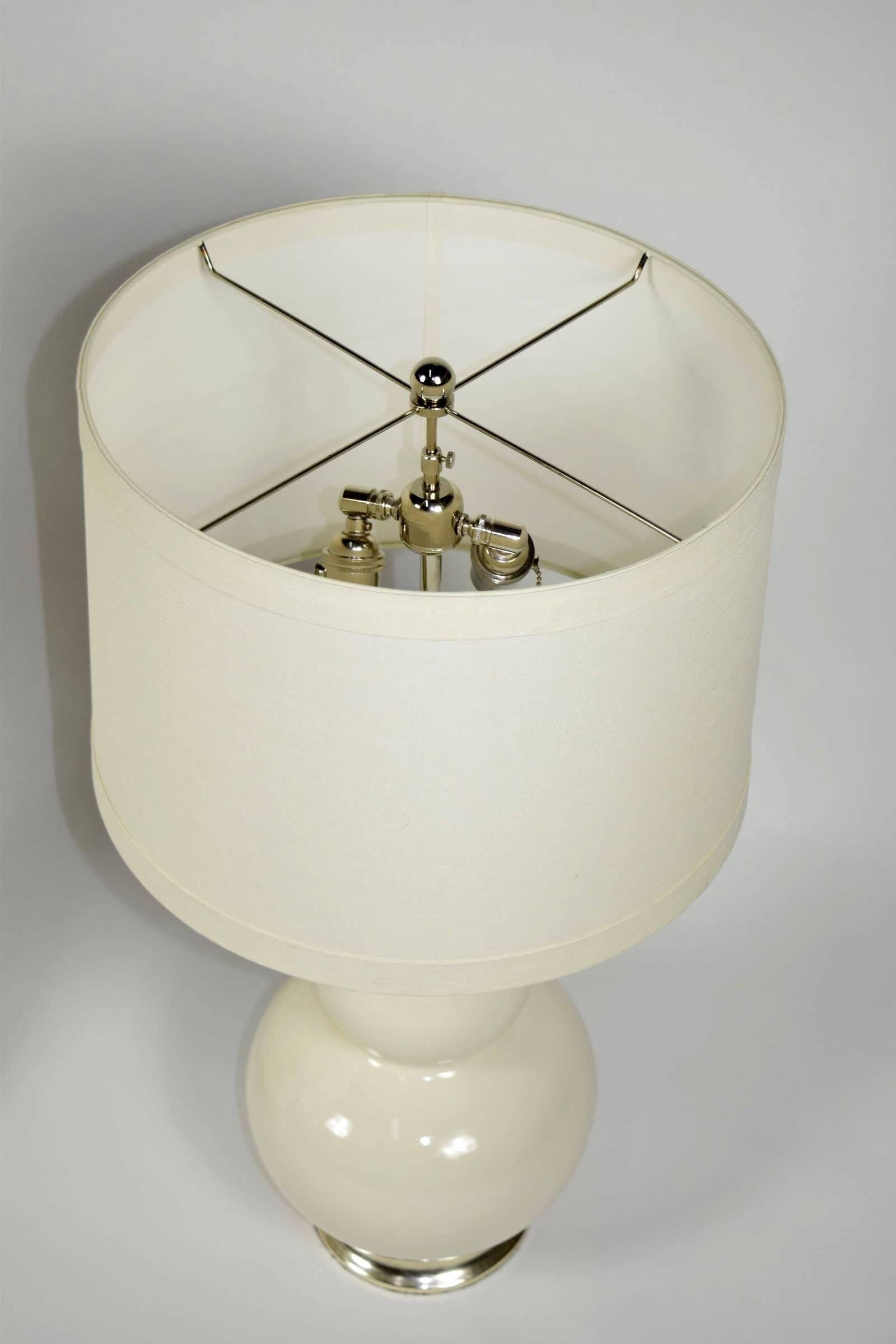 Pair of Christopher Spitzmiller Lamps in White with Silver Leaf Bases In Excellent Condition In Dallas, TX