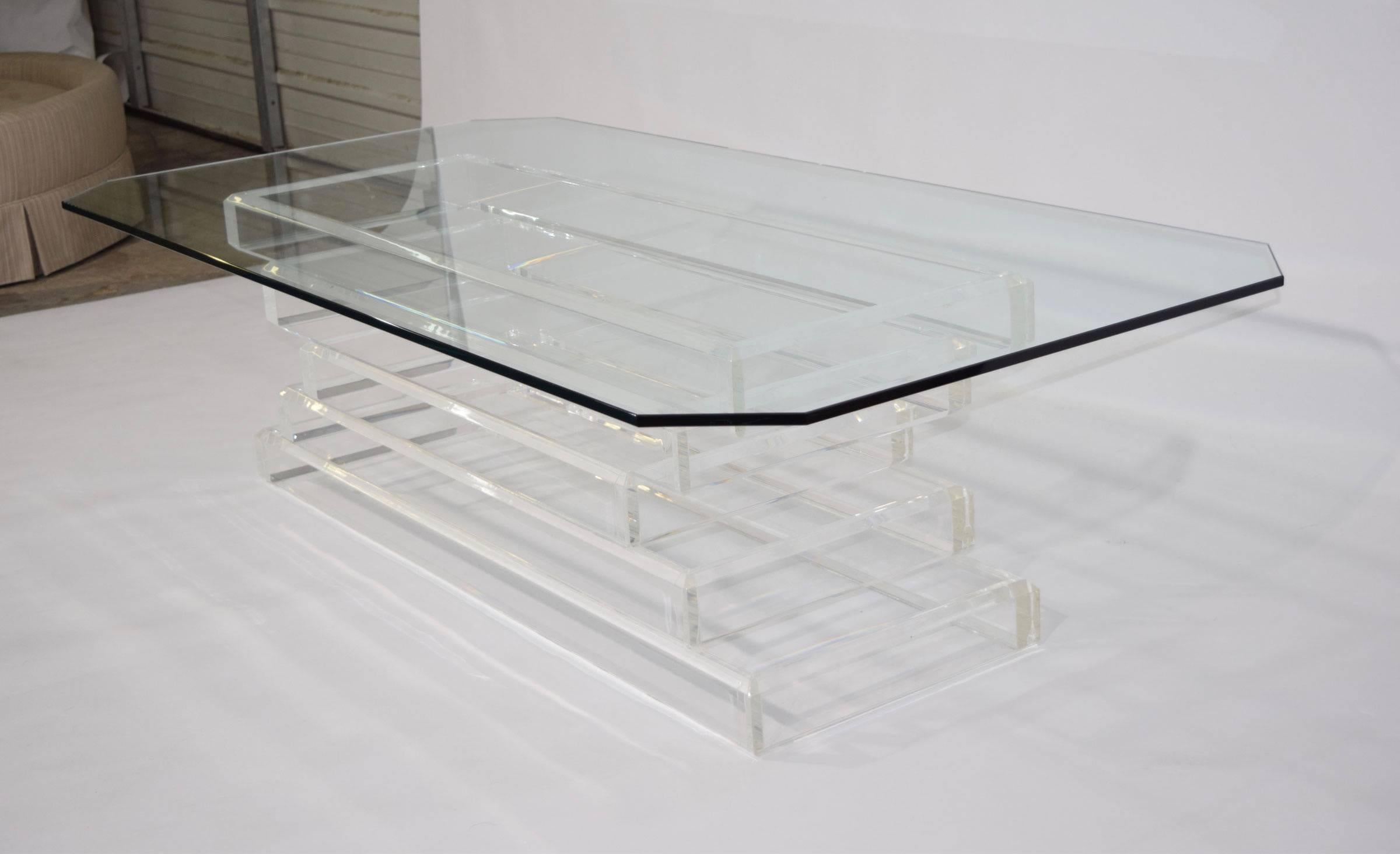 A beautiful stacked Lucite coffee table. Glass top is 3/4