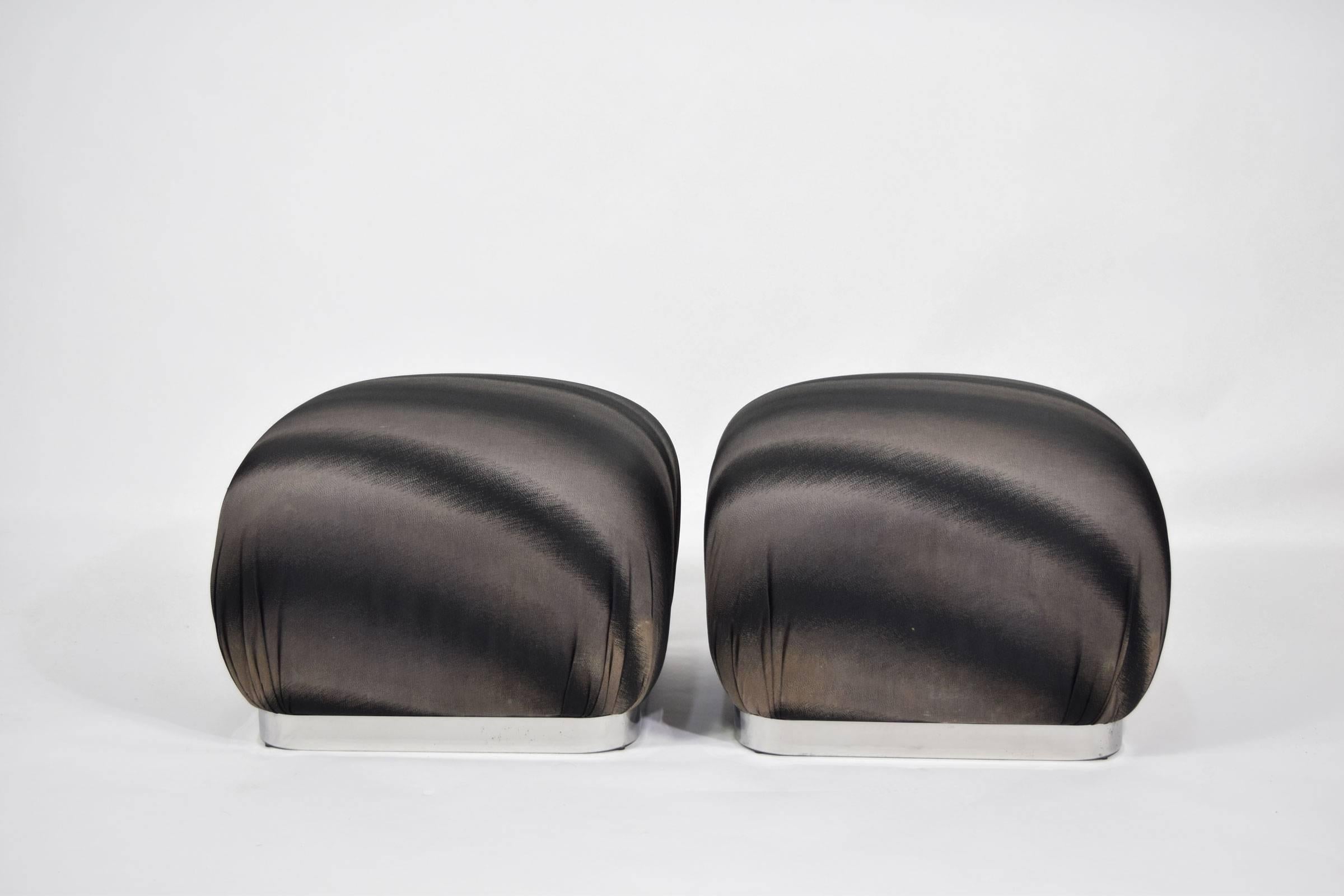 Pair of Souffle poufs in the style of Karl Springer by Weiman. Have chrome trim on base.