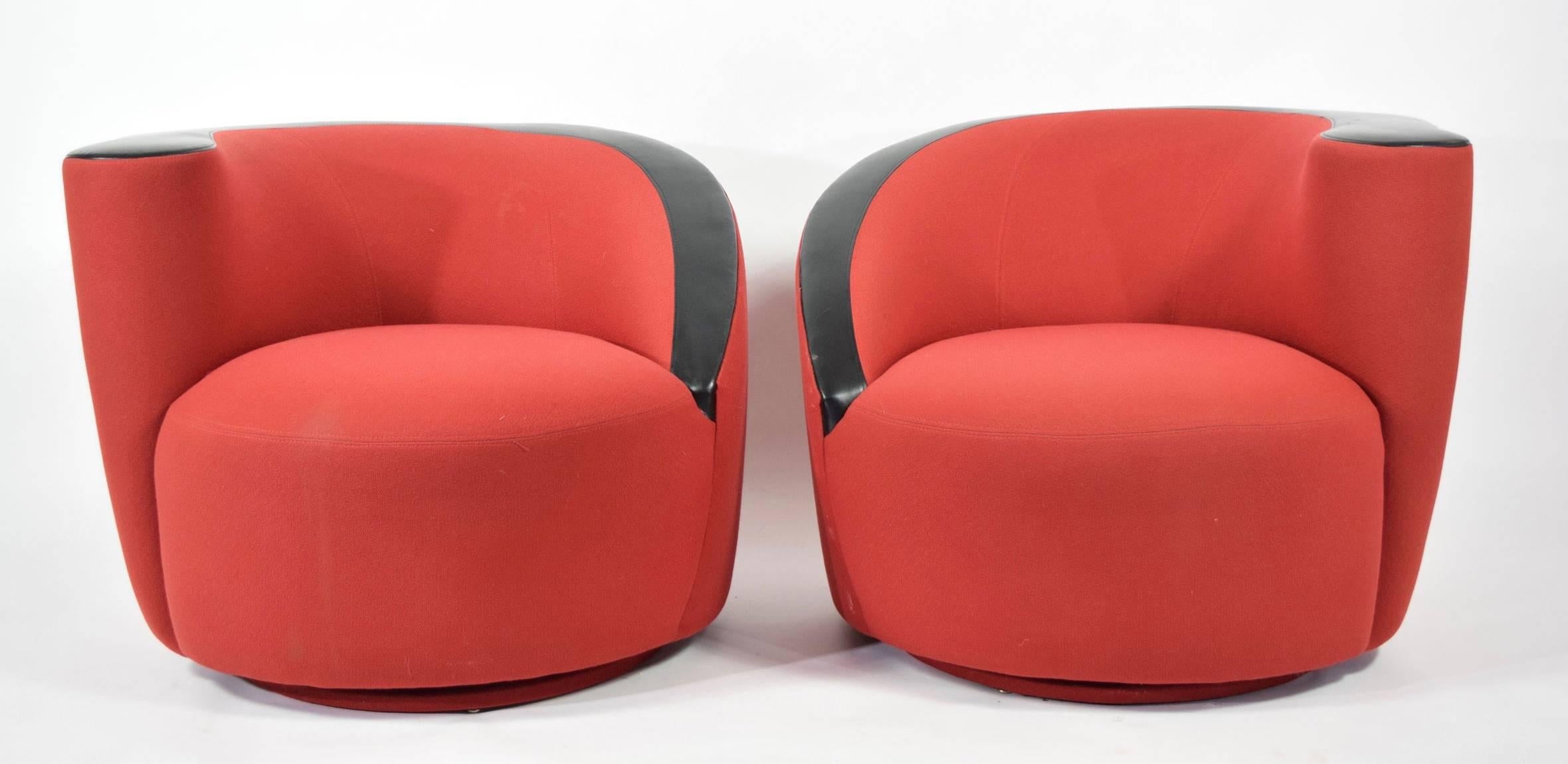 Pair of Vladimir Kagan Nautilus/Corkscrew chairs in red with black leather trim. Chairs swivel.