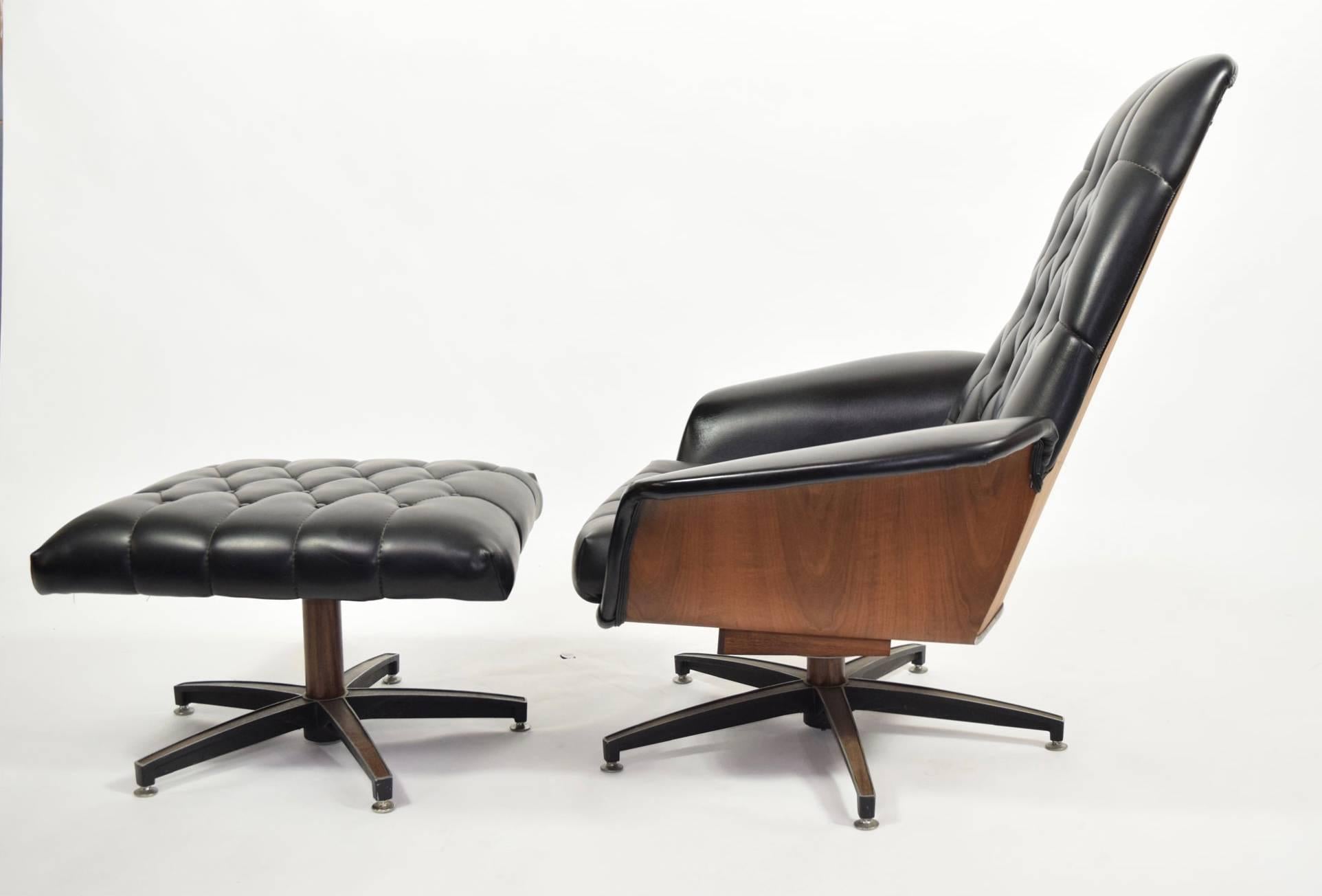 Great looking Mid-century modern leather chair and ottoman. Barely used. Chairs rocks and swivels.