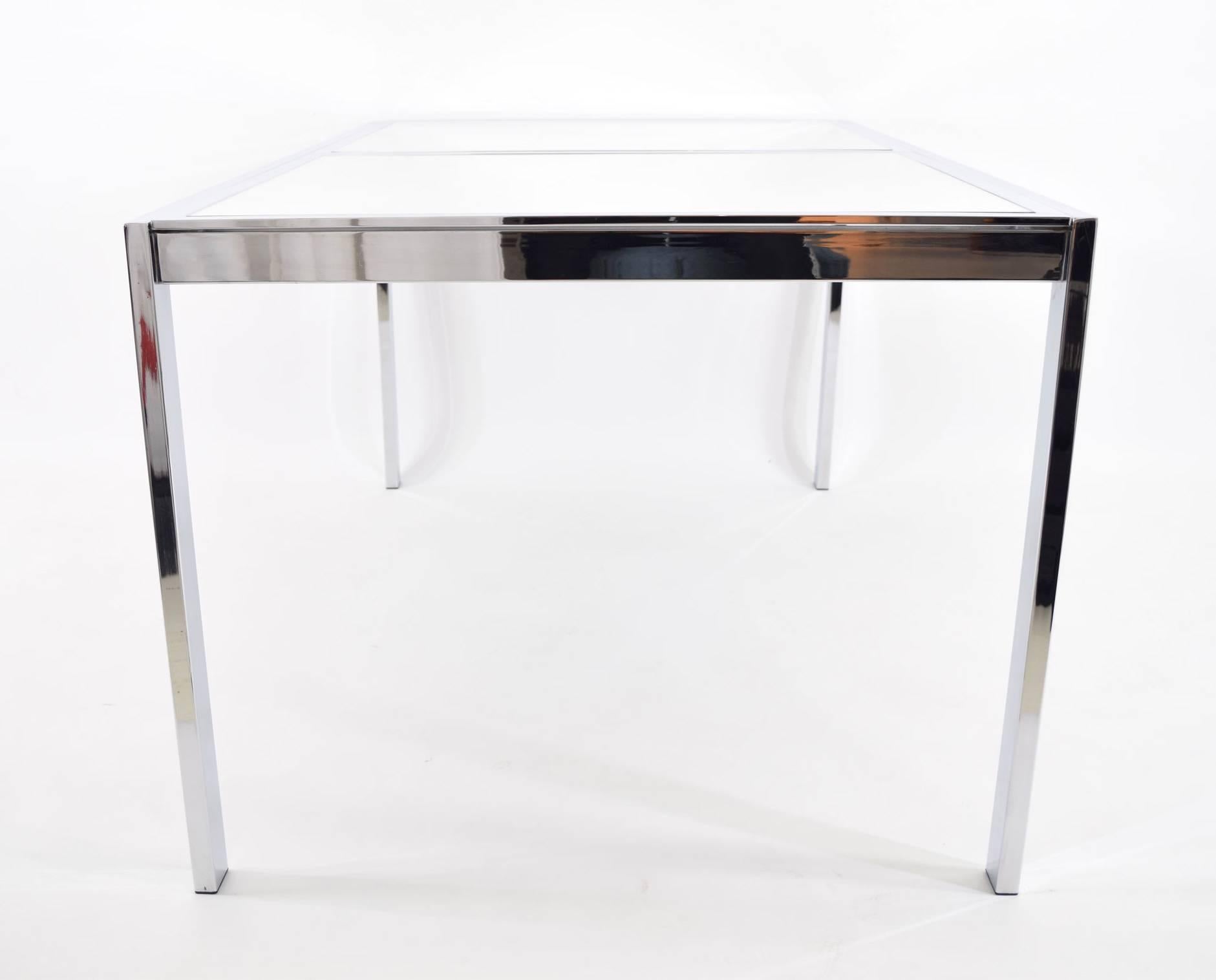 DIA chrome finish dining table or desk with mirrored top. Chrome is bright and shiny.
