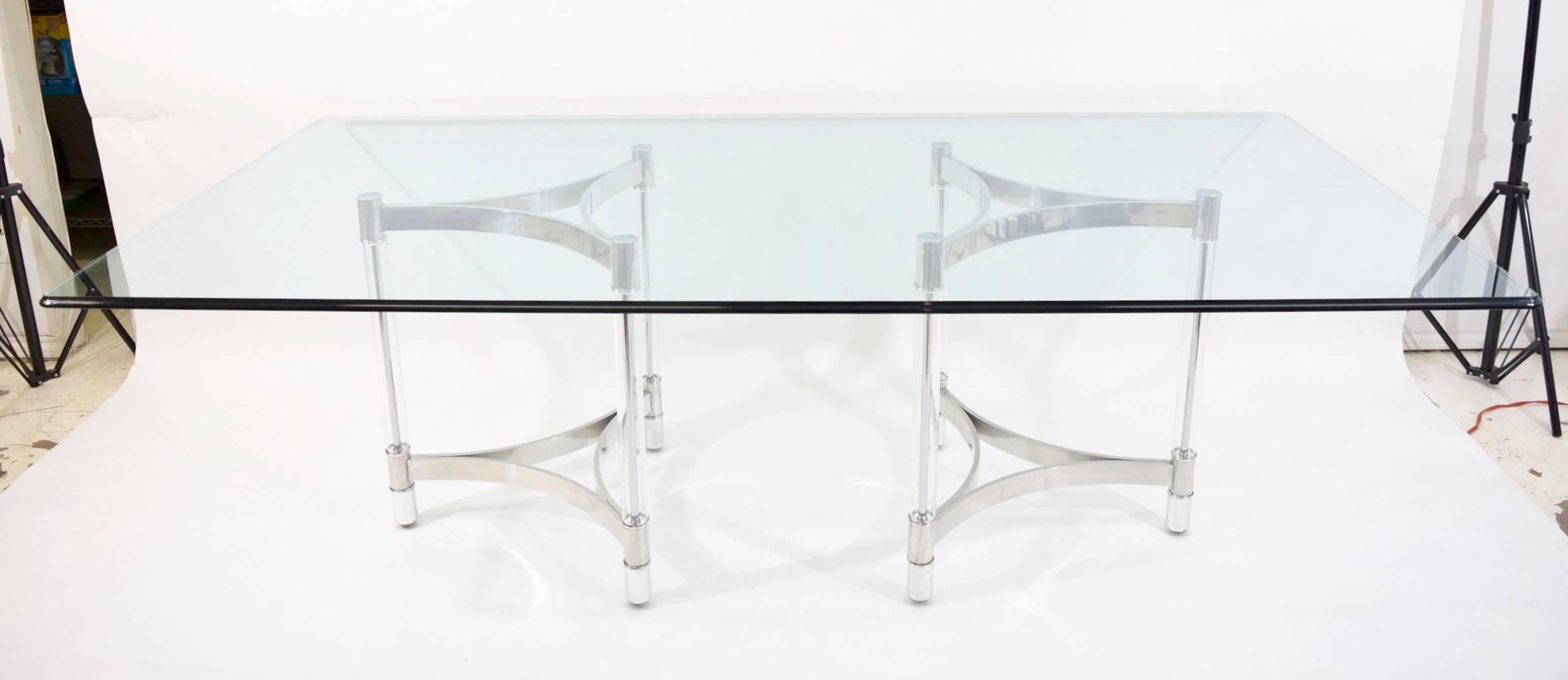 Glass top dining table by Alessandro Albrizzi.