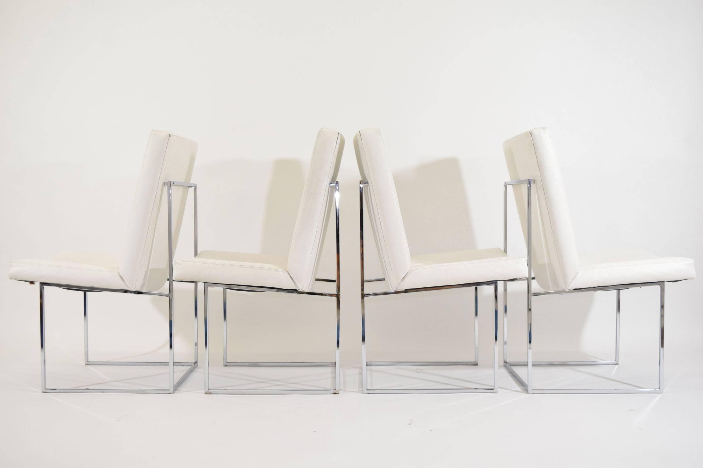 A set of four dining chairs by Milo Baughman for Thayer Coggin. We have eight of these available. Dated 1976.