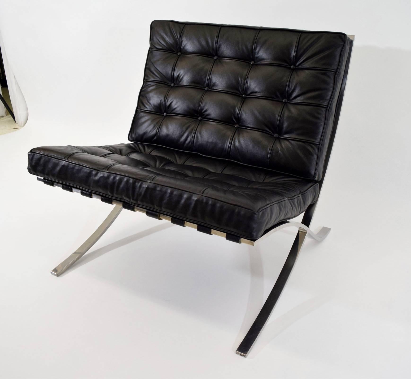 Vintage Barcelona chair by Mies van der Rohe in stainless steel and leather.