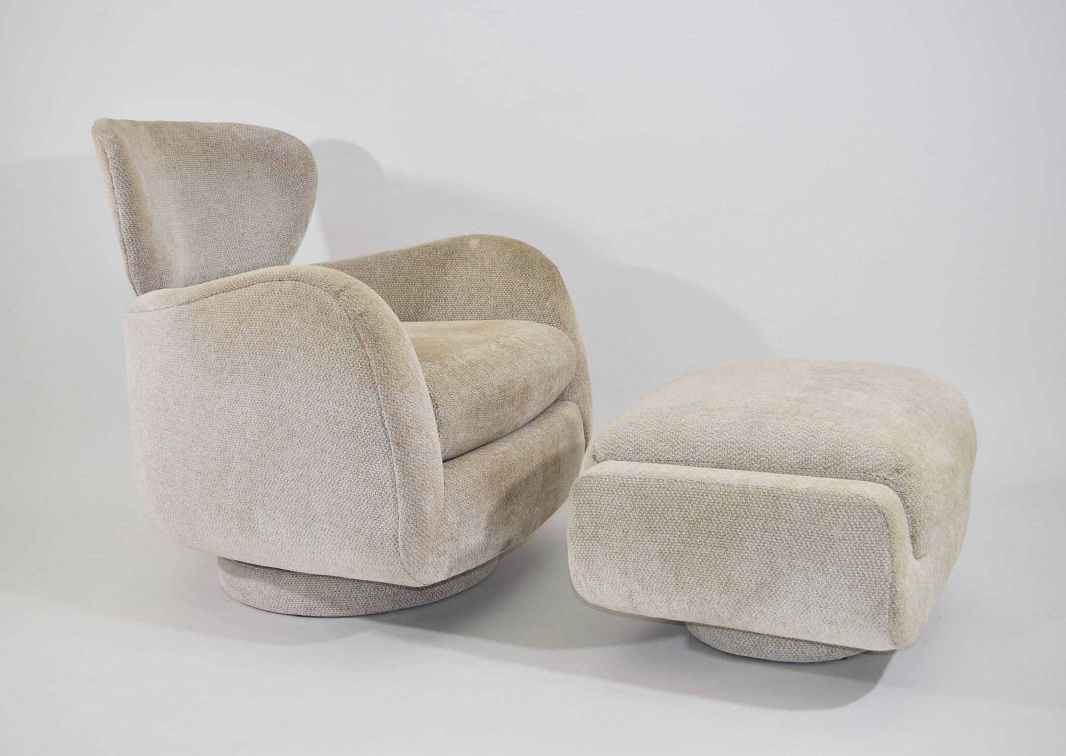 Vladimir Kagan style swivel lounge chair and ottoman by Directional. Dimensions are for chair only. Ottoman is 16"H x 26.25"W x 22.5"D. 