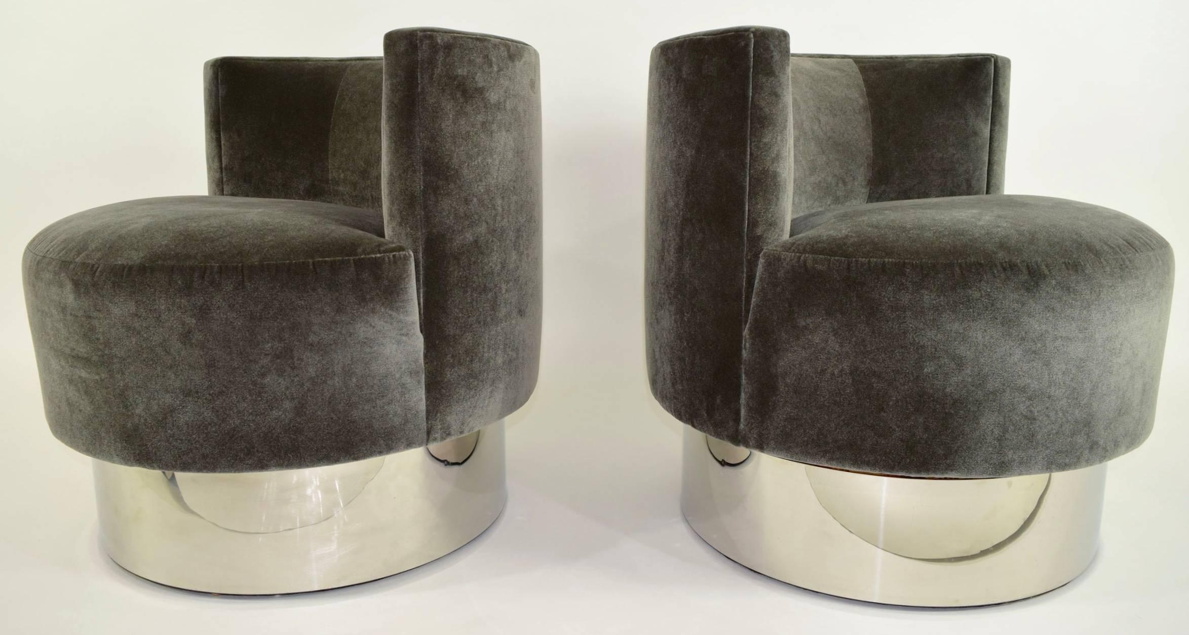 A wonderful pair of Milo Baughman lounge chairs newly upholstered in Holly Hunt Great Plains fabric. The fabric is soft and glamorous. Bases are chrome. This can be changed to brass finish if desired.