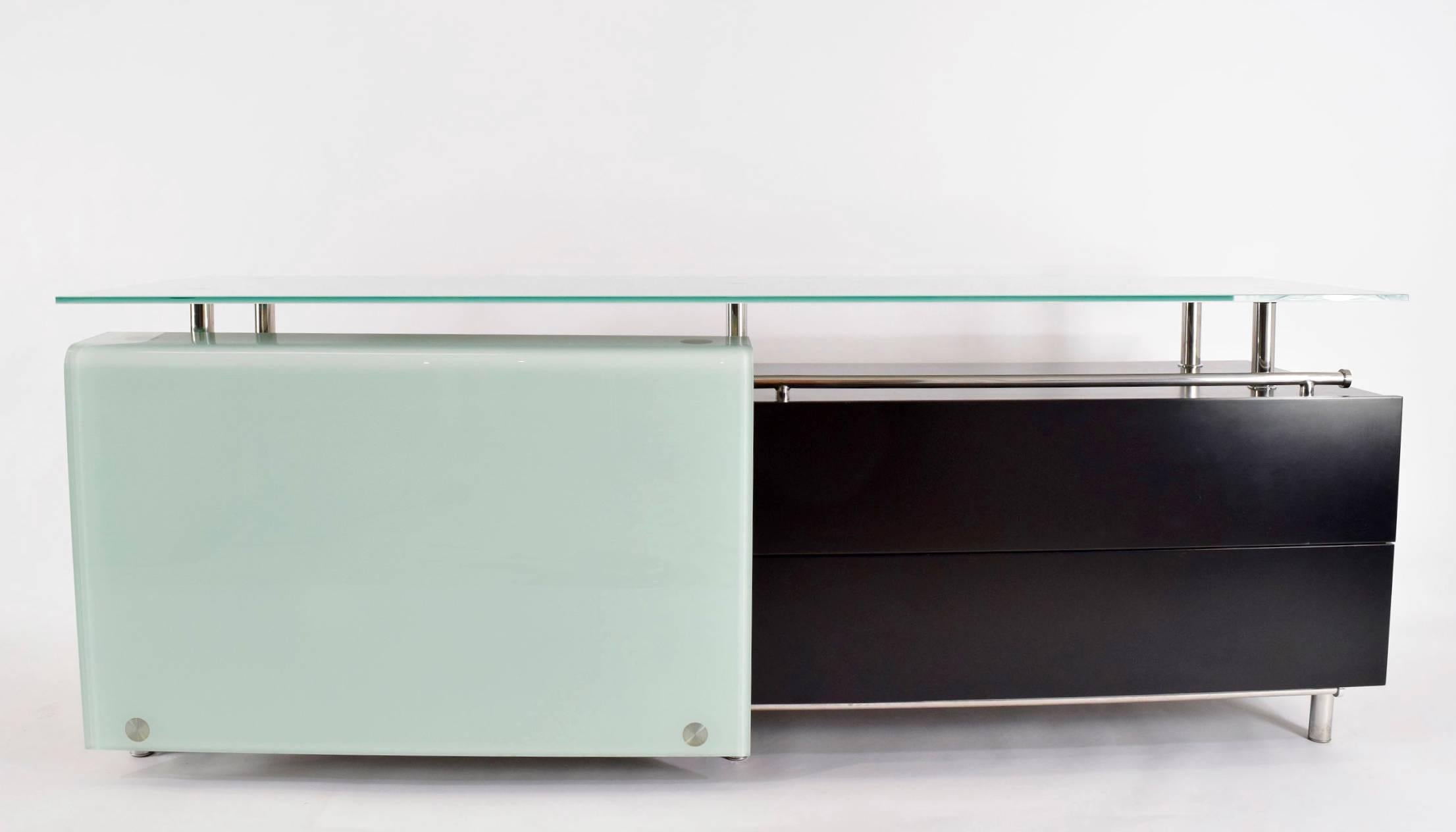 Italian frosted glass and wood credenza with sliding glass door and glass top.