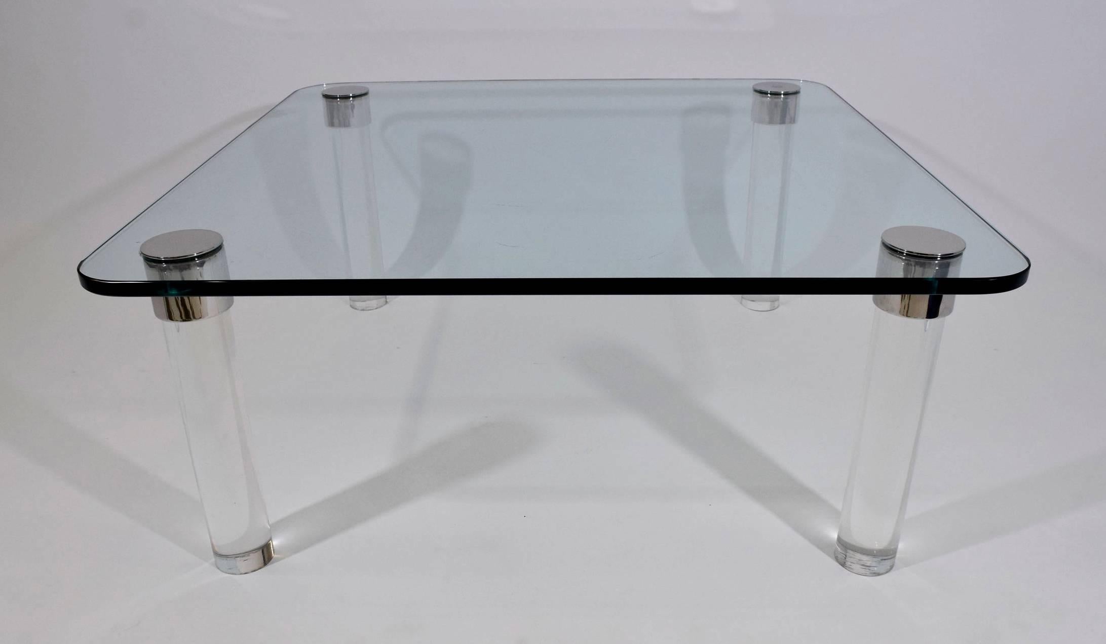 Beautiful pace coffee table with chrome trim and Lucite legs. Glass is 3/4