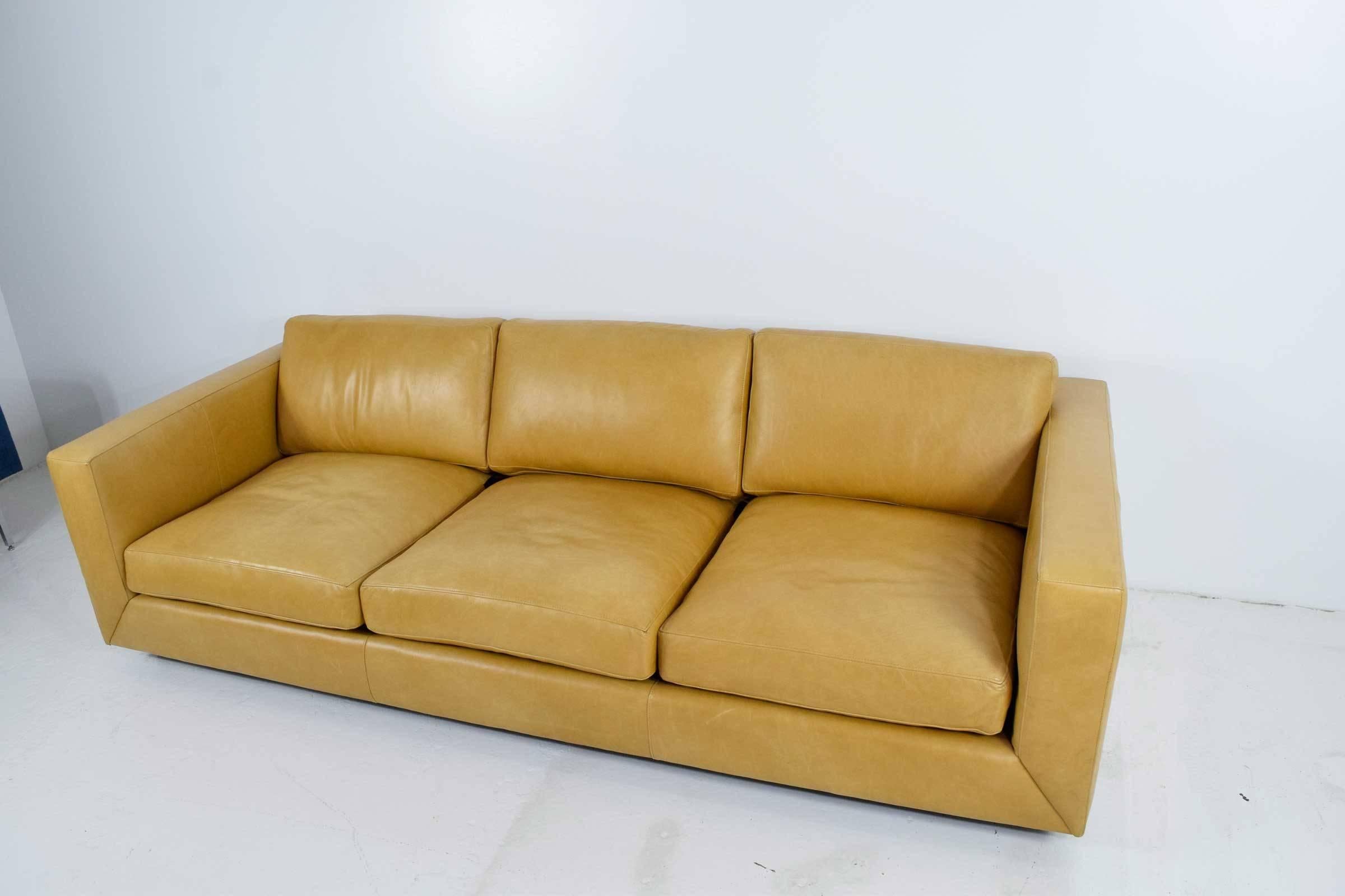 In great condition, three-seat leather sofa by Jonathan Adler.