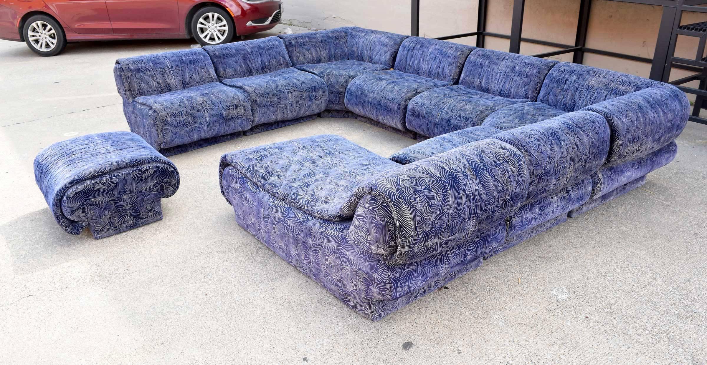 This is a wonderful and comfortable sectional by Preview Furniture Company, in the style of Vladimir Kagan. There are nine pieces which include a chaise and an ottoman. The sofa can be configured in multiple ways. I wish the fabric was cleanable but