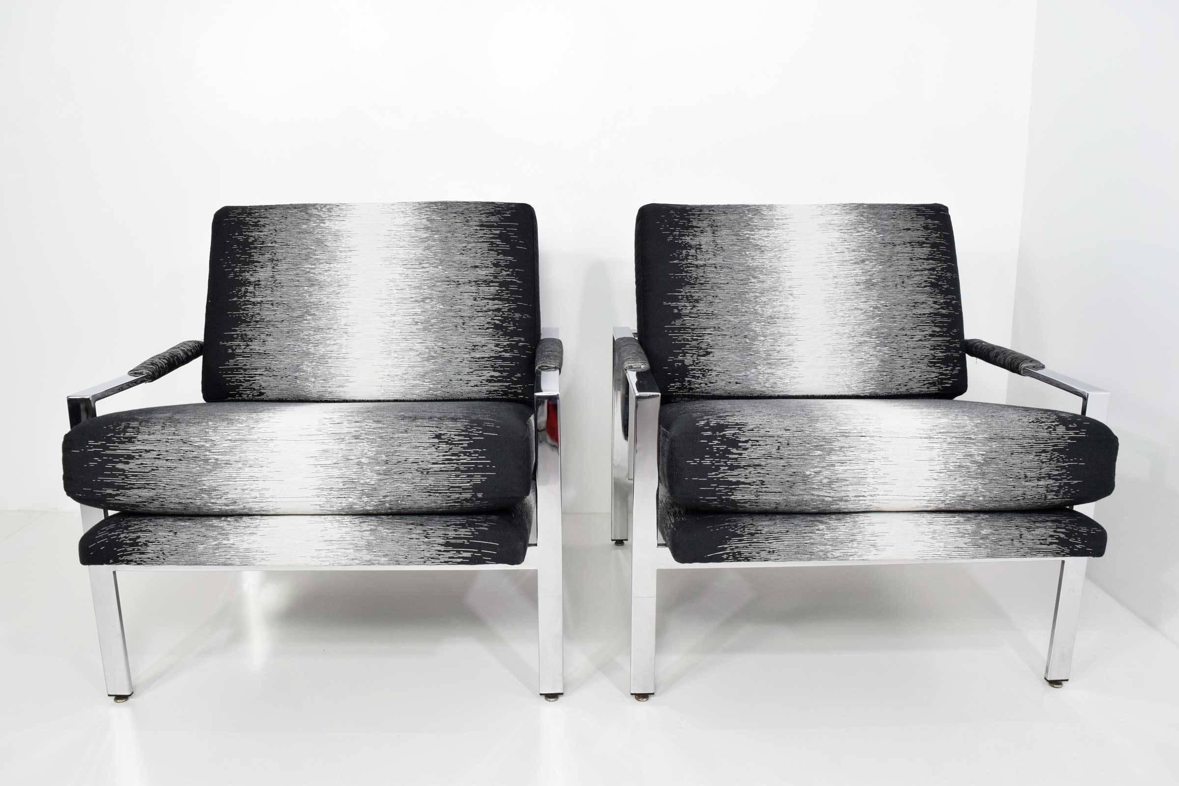 Shiny chrome frames, Kirkby design upholstery, Duo Noir. Black, grey and white. New foam.