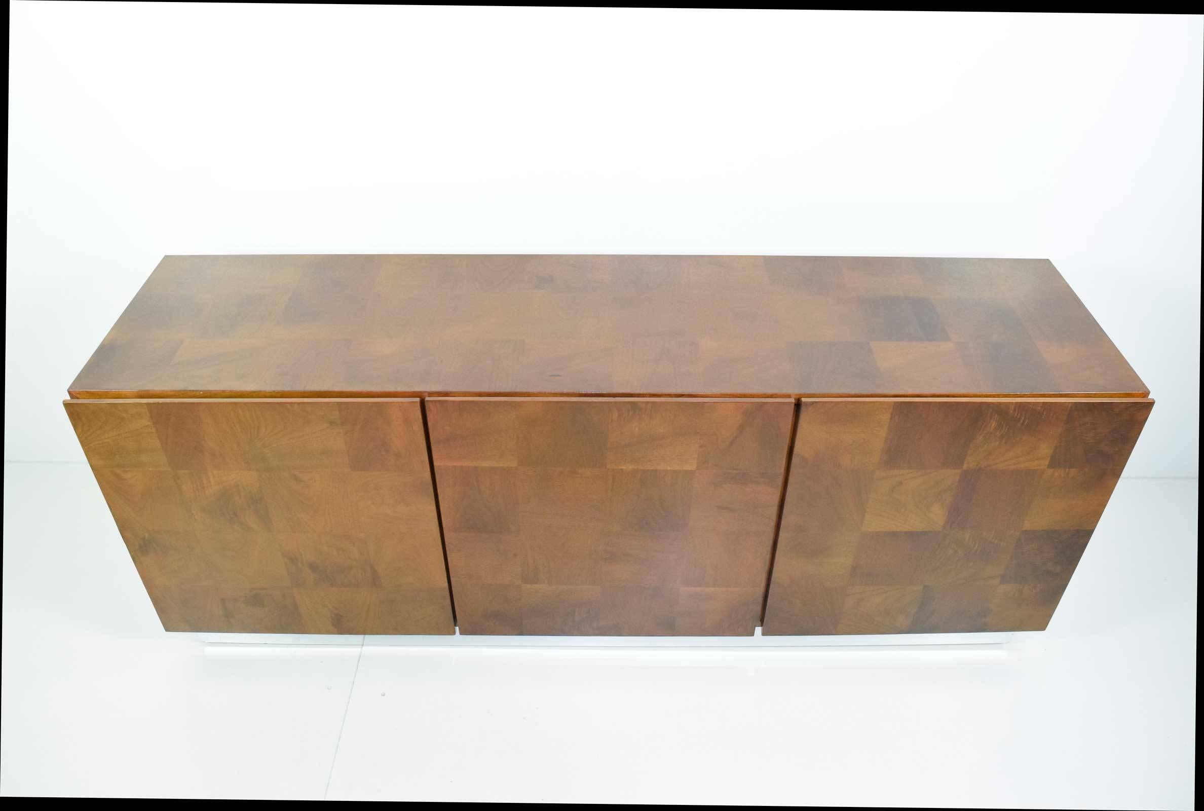 Fully restored burl wood credenza in walnut parquet pattern. Chrome base, gloss lacquer finish. By Milo Baughman for Thayer Coggiin.