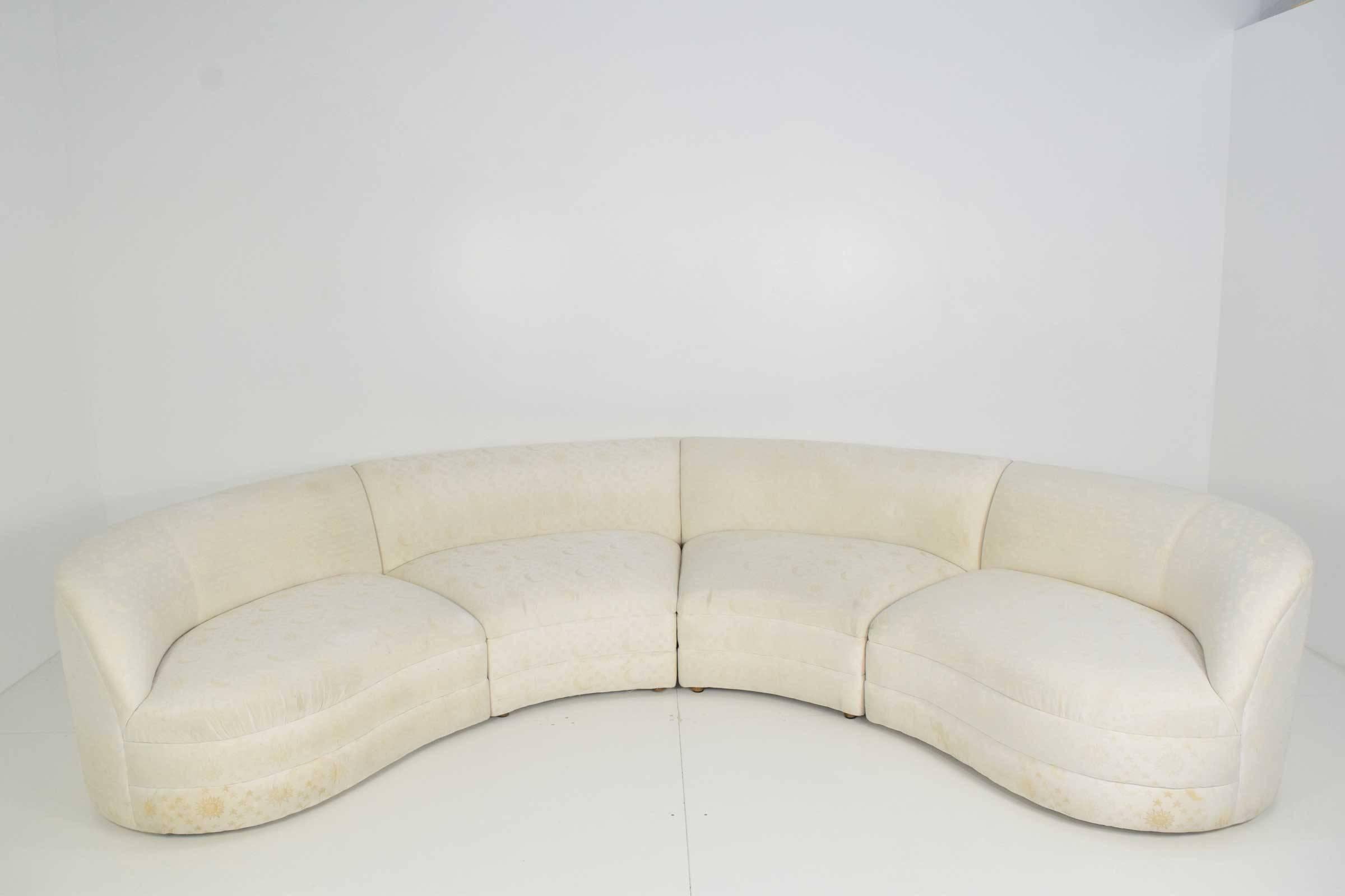 This sofa was designed by Vladimir Kagan for Cantoni. It is four sections with alligator clips to keep together. Beautiful serpentine shape. Sofa does need new upholstery.
