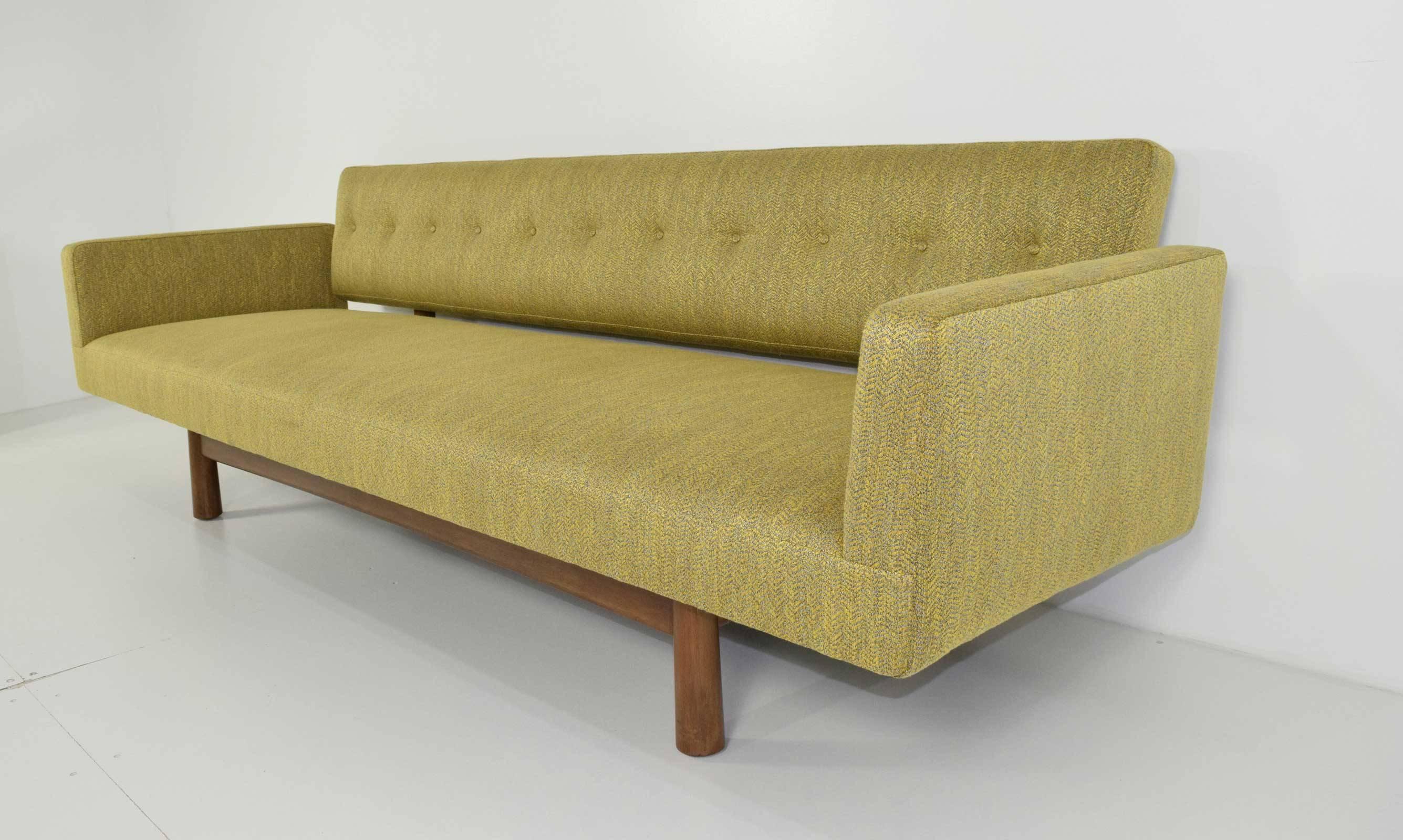 Quality construction, fully restored. Beautiful #5316 sofa by Edward Wormley for Dunbar. In Ligne Roset upholstery. Mahogany frame, brass fittings. This sofa is beautiful from any angle.