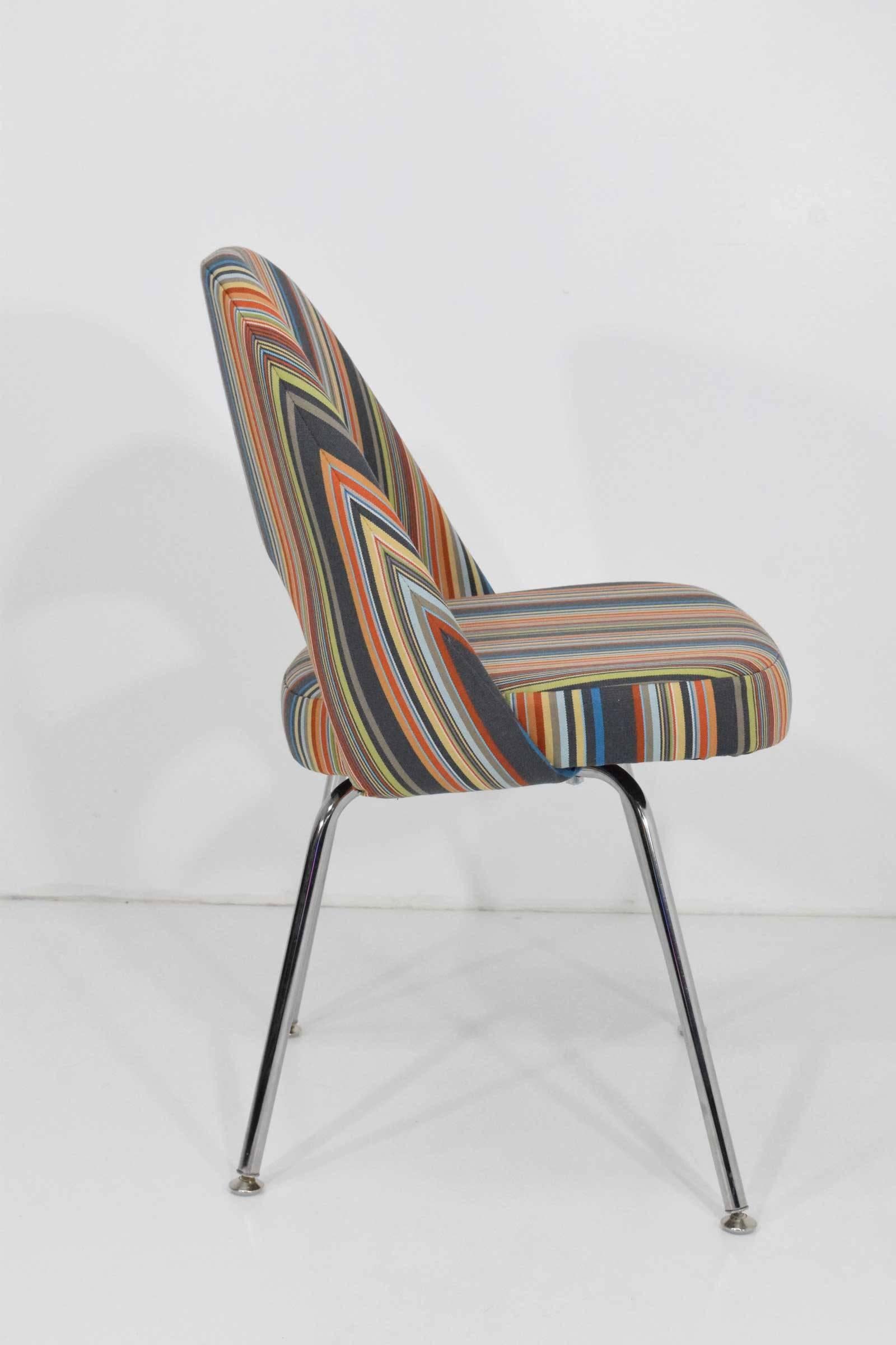 We have up to 8 chairs by Eero Saarinen for Knoll. Upholstered in Stripes by Paul Smith ($135/yard). We can sell in smaller lots if desired.