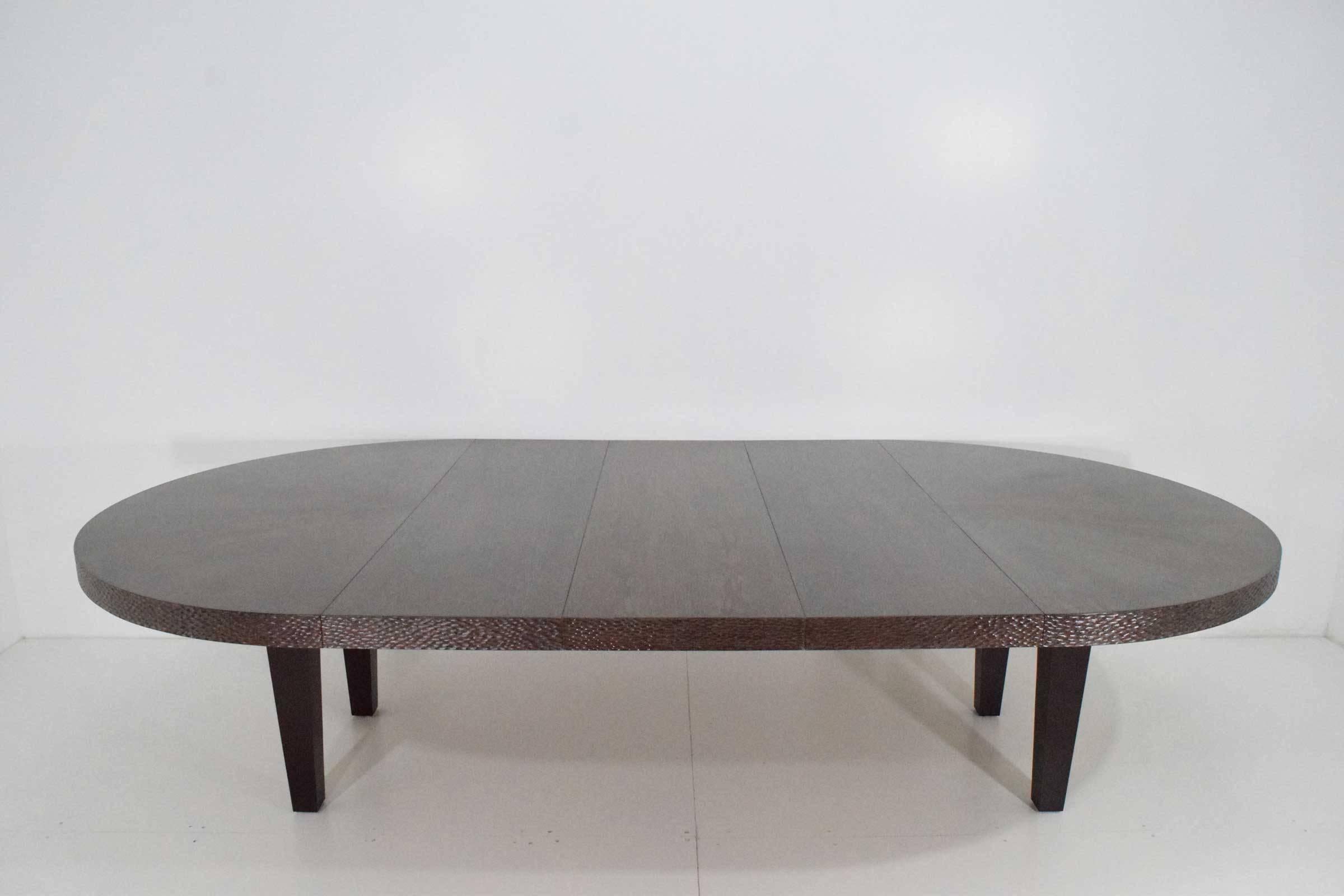 Beautiful dining table by Berman Rosseti, scalloped sides, cerused oak. Table has three leaves to adjust as needed. Is a 66' diameter table without the leaves.