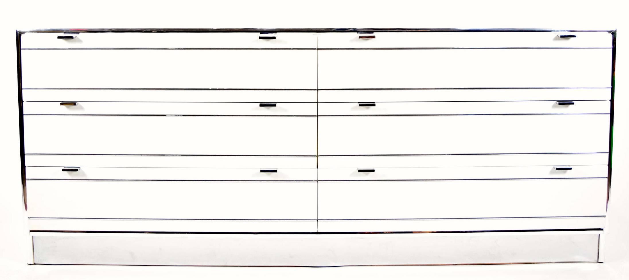 High style Rougier cabinet/dresser in white laminate with chrome accents and trim. Six drawers in dresser. 