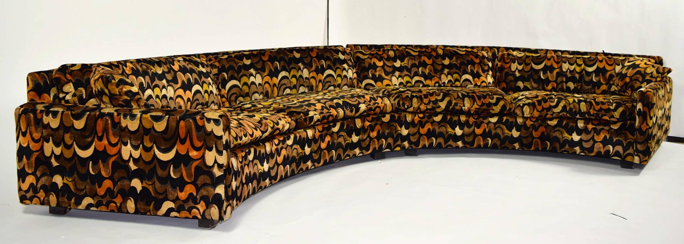 This is a two piece, large half-moon shaped sofa by Milo Baughman for Thayer Coggin. Upholstery is Jack Lenor Larsen and in excellent condition. Fabric is a rich, psychedelic velvet. Super luxurious. 