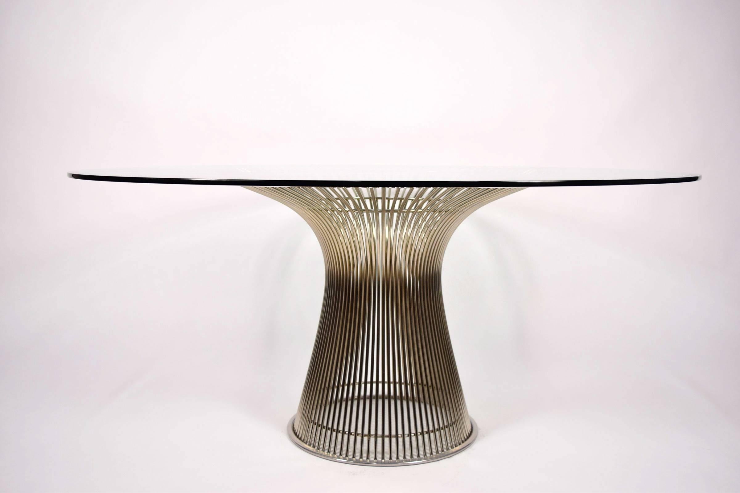 Dining table by Warren Platner for Knoll. Table has nickel-plated steel base. It is shown with a 60