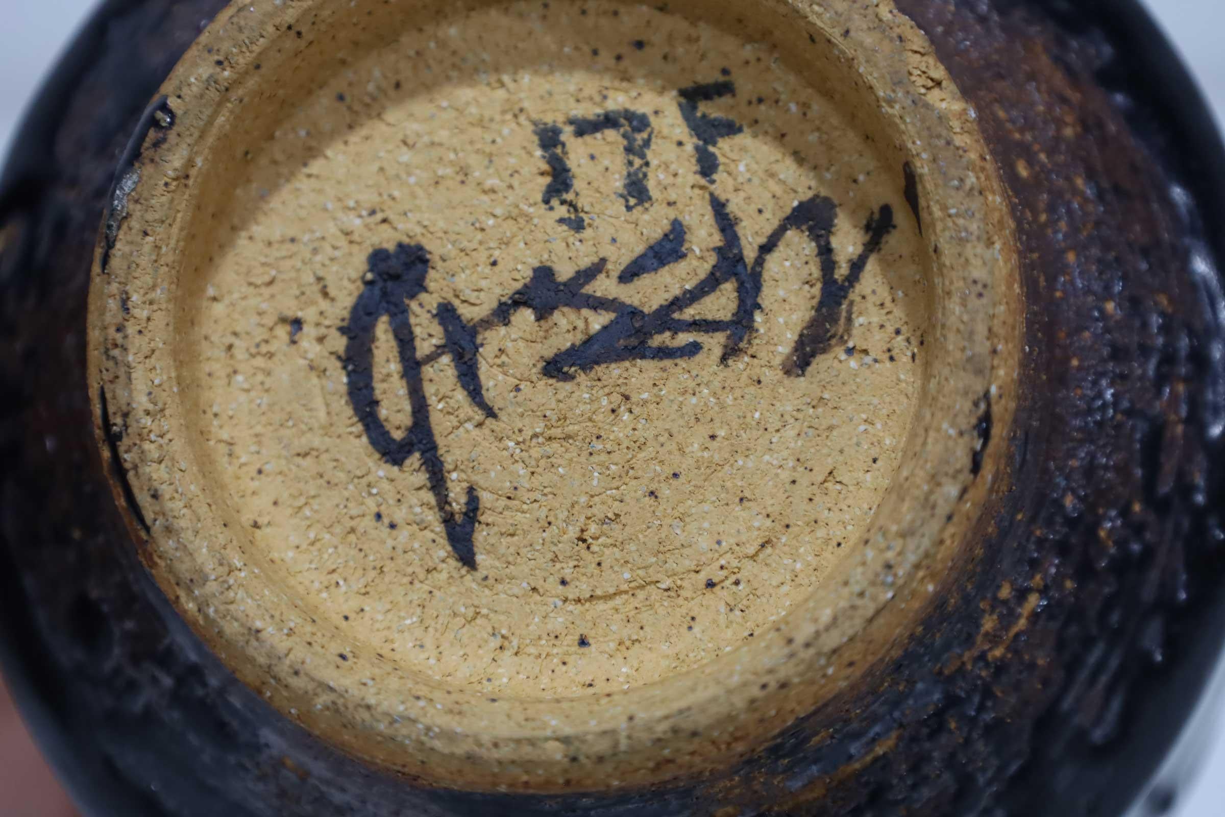 A potter and painter, Albert Green (1914 - 1994) earned an international reputation for his ceramics, stoneware, and canvases. A graduate of the University of Pennsylvania, he studied painting at the Art Students League in New York City, supporting