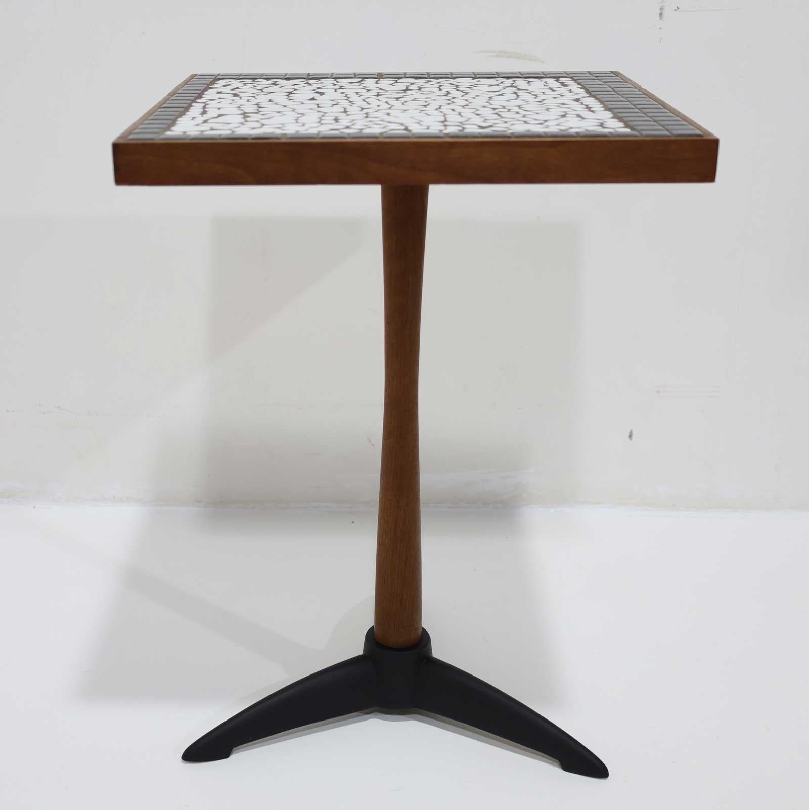 Super cute ceramic tile top side table in black and white tiles, wooden stem and black painted metal base. Fits anywhere you need a side table. 