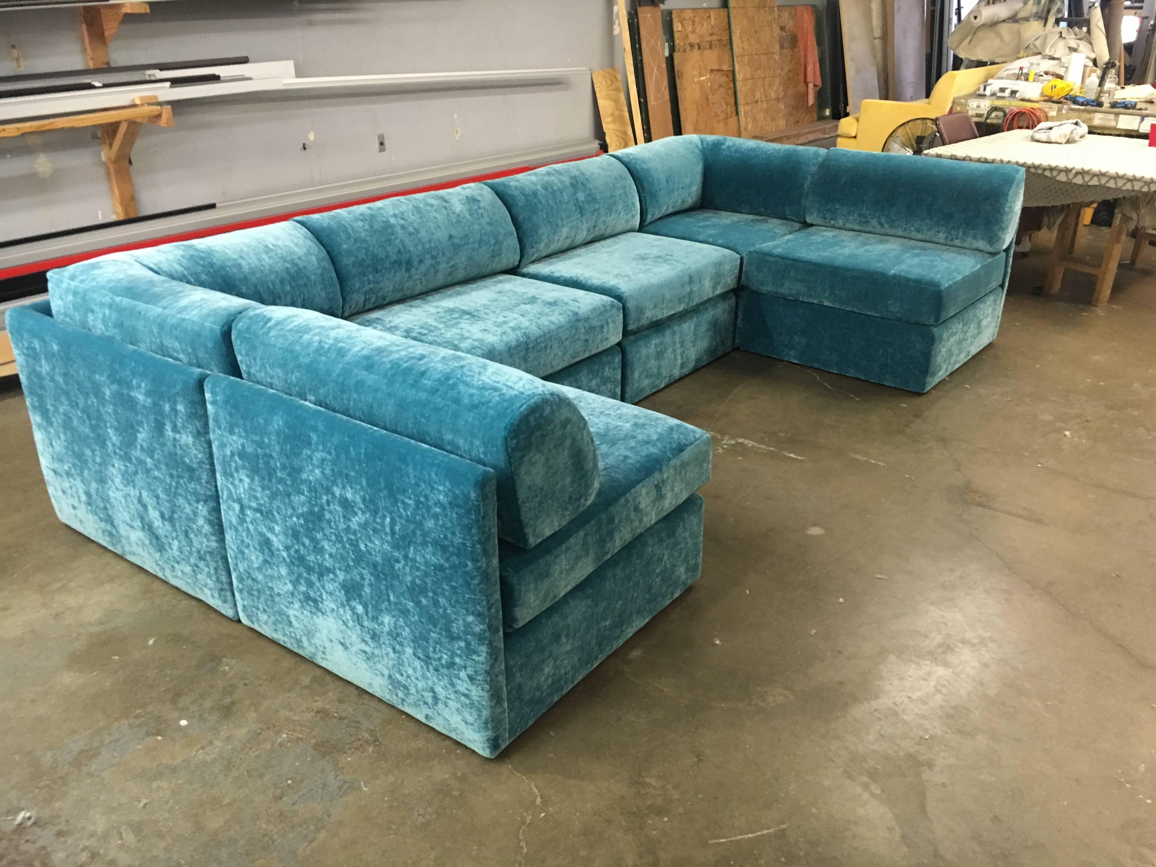 Multiple configurations available. Seven-piece sectional by Milo Baughman for Thayer Coggin. Upholstery is in OK condition, no rips or tears. But these look great redone in an up to date fabric. We attached of photo of an identical sofa that we