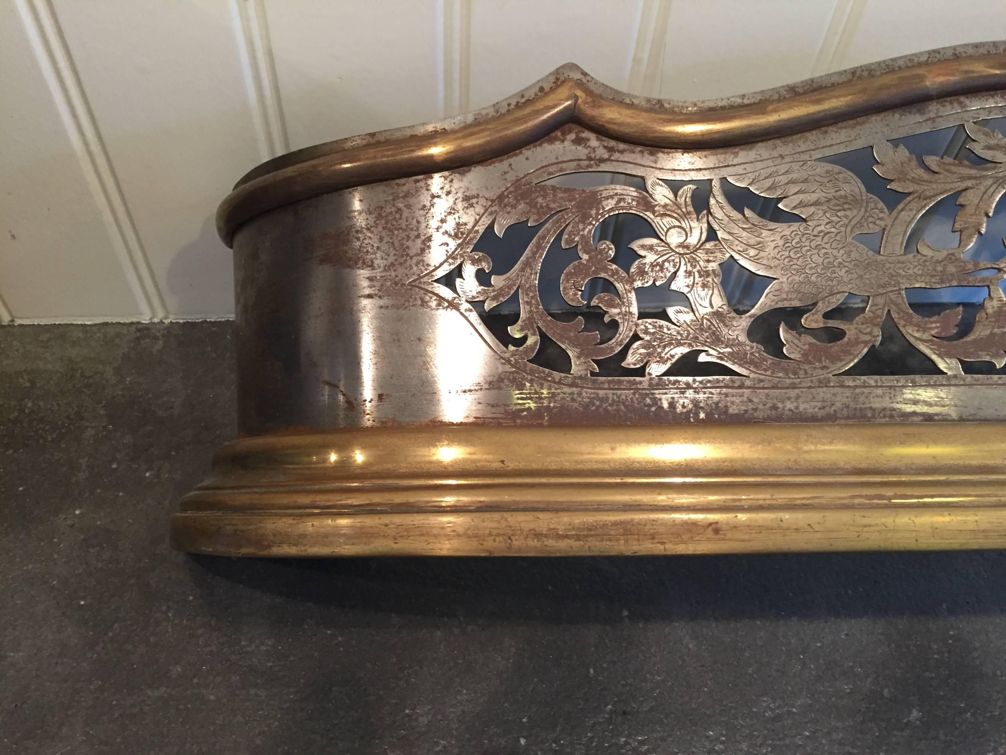 English Georgian Pierced Steel and Brass Fireplace Fender For Sale