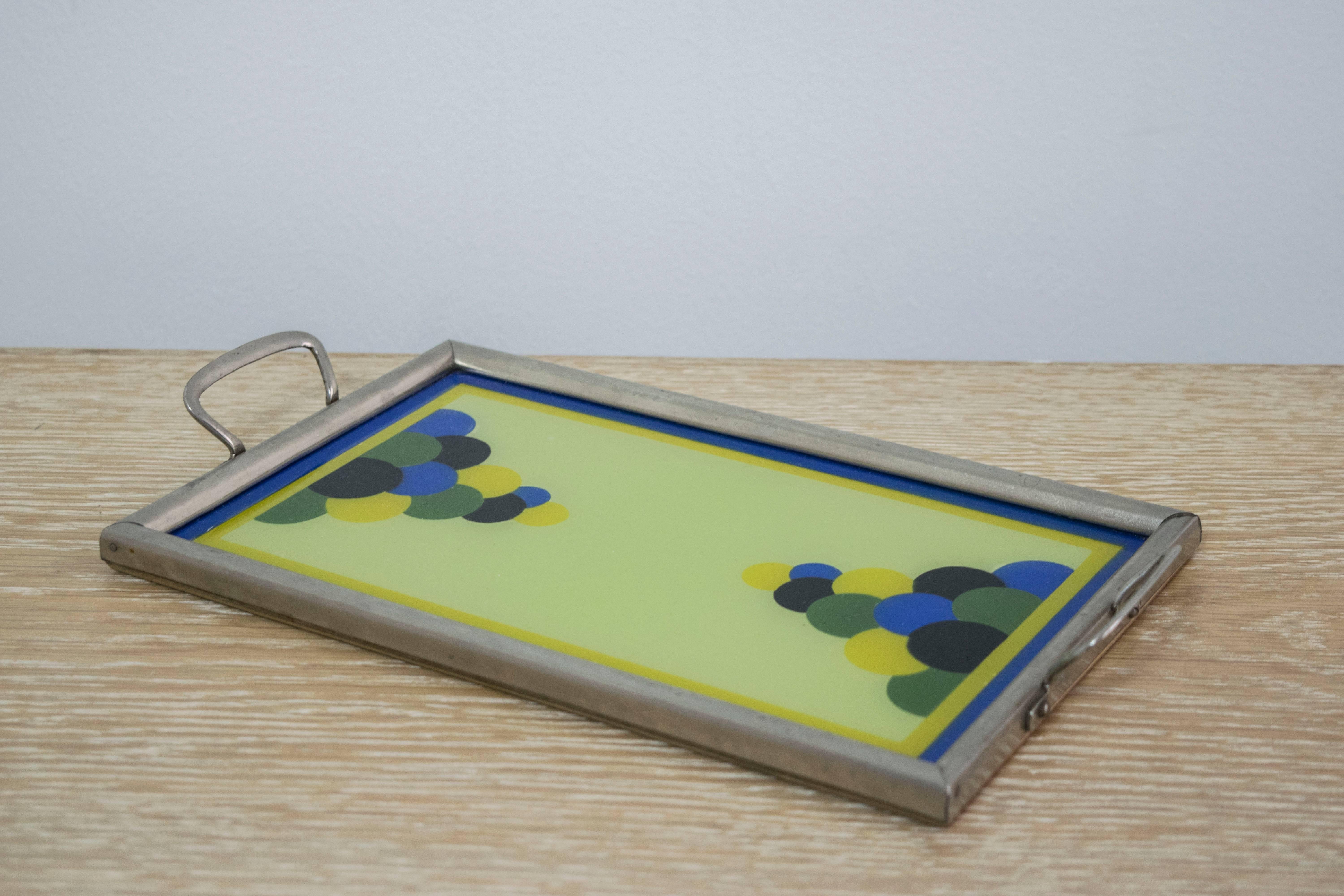 Hand-painted Bauhaus wooden tray with glass top and silver handles with detailing typical of Bauhaus fine design. This is an exquisite jewel, like a painting.