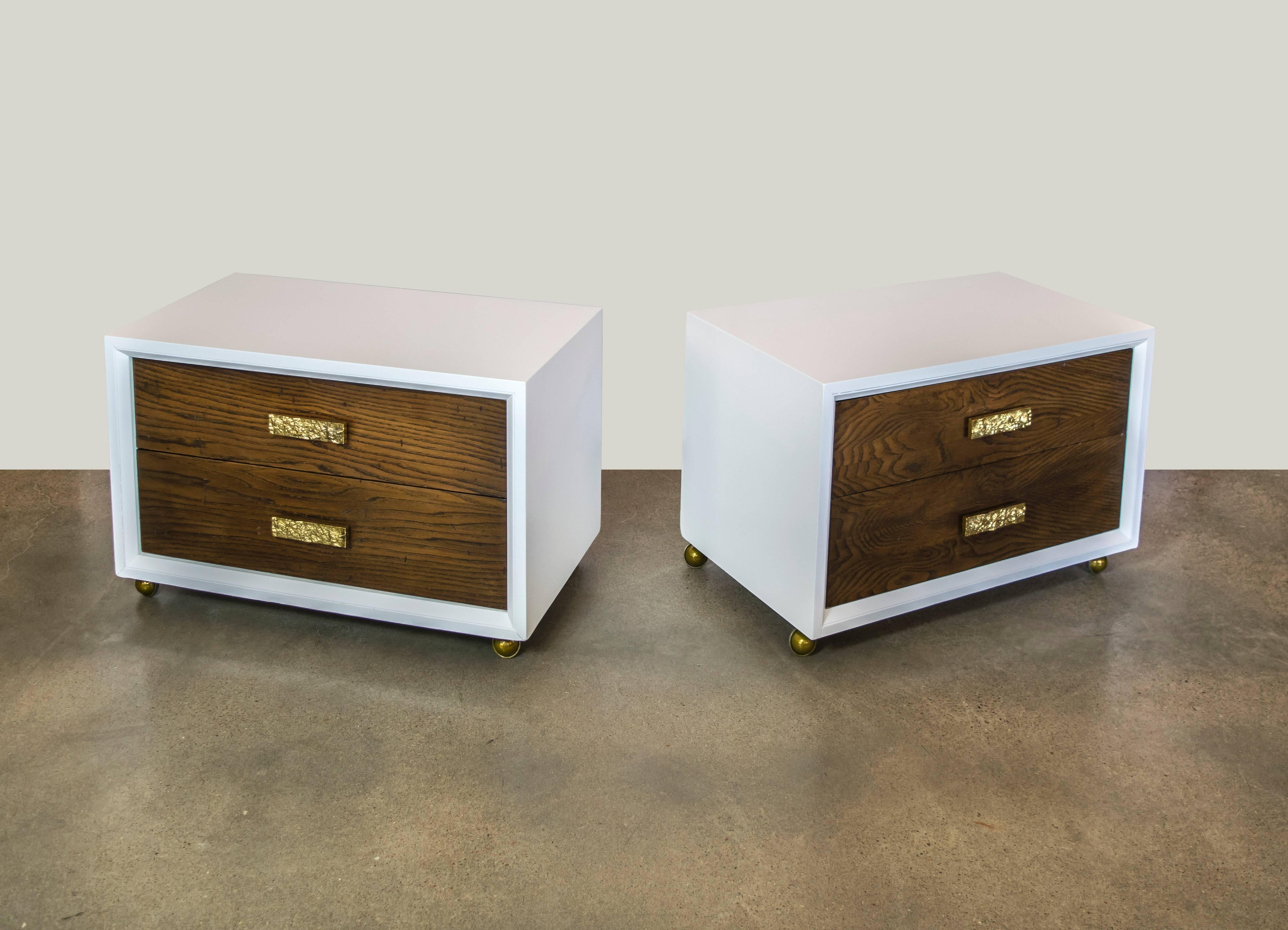 Very elegant Kent Coffey nightstands with unusual Brutalist brass hardware set on casters. These nightstands are wide and deep and an elegant addition to any bedroom.