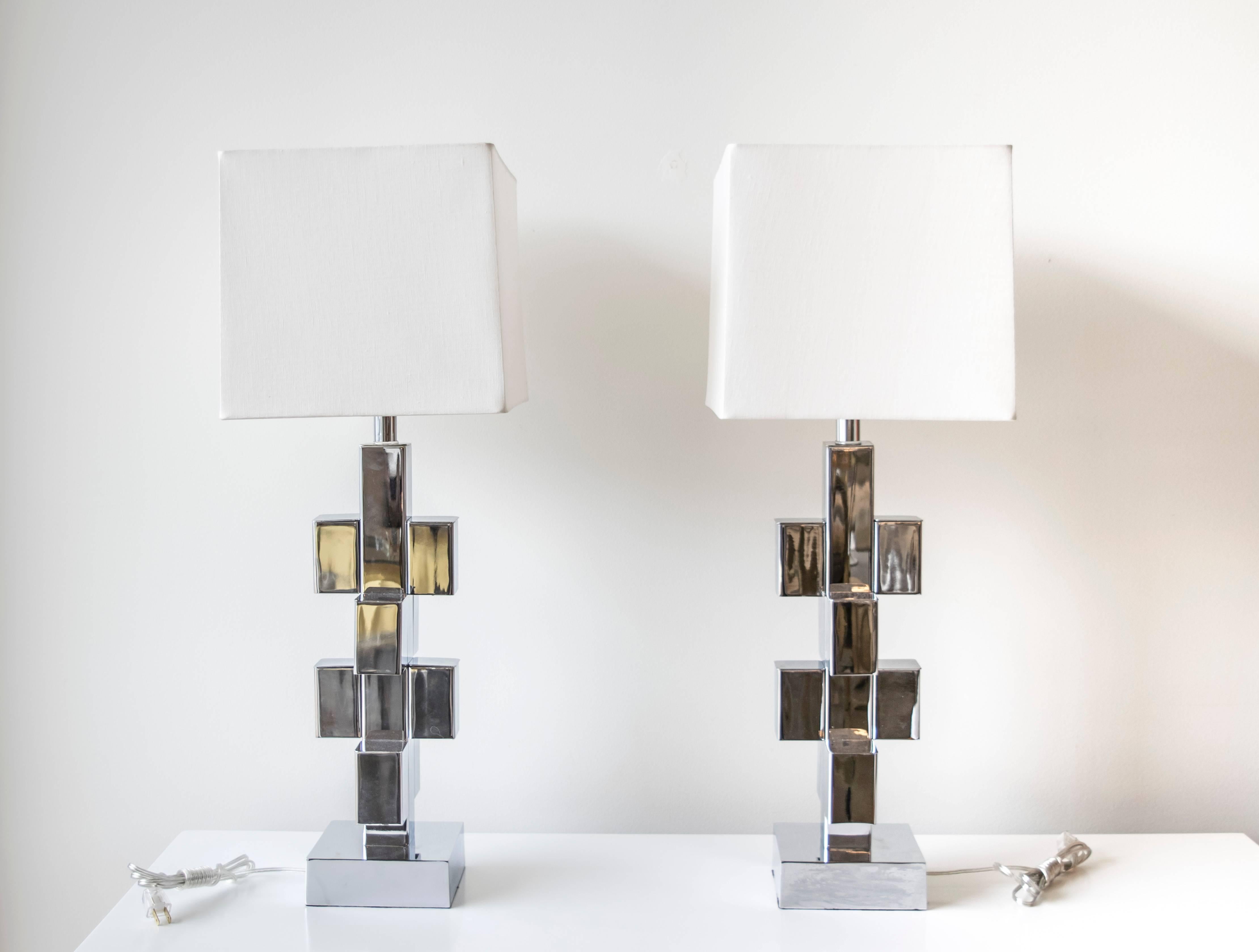 These are extremely rare chrome sculptural three-dimensional lamps that look amazing from any angle. The lamps are very sturdy, well made and without any noticeable marks.
