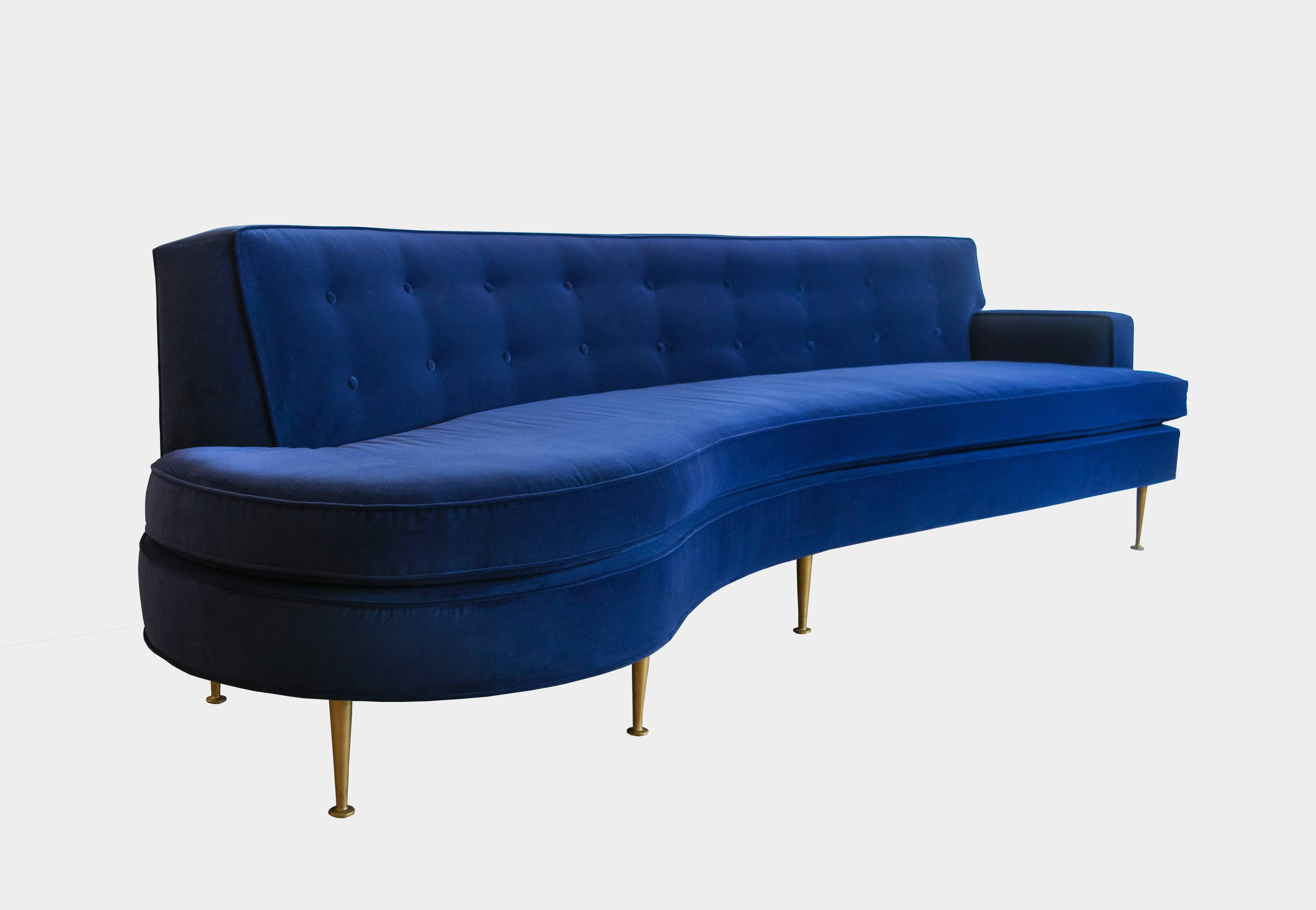 We don't know who designed this exceptional sophisticated and stylish sofa from the 1950s; the original tag said Allen Furniture. One end of the sofa is open armed, similar to Vladimir Kagan but also characteristic of Harvey Probber. It has been