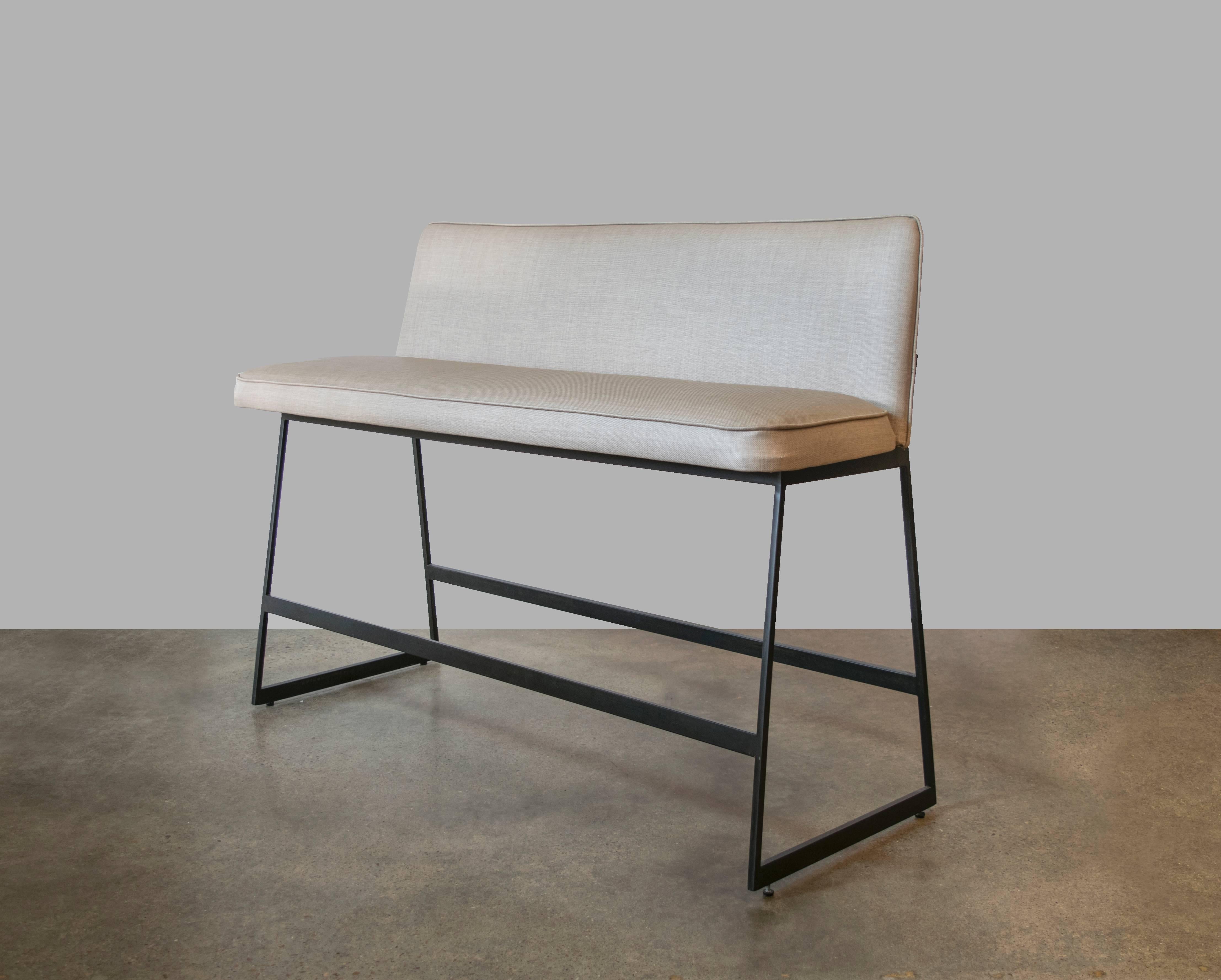 Beautiful counter height benches by Gimo Fero that are covered in the original linen vinyl. Back profile is elegantly minimal. Benches are sold as a pair but could also be sold separately.
