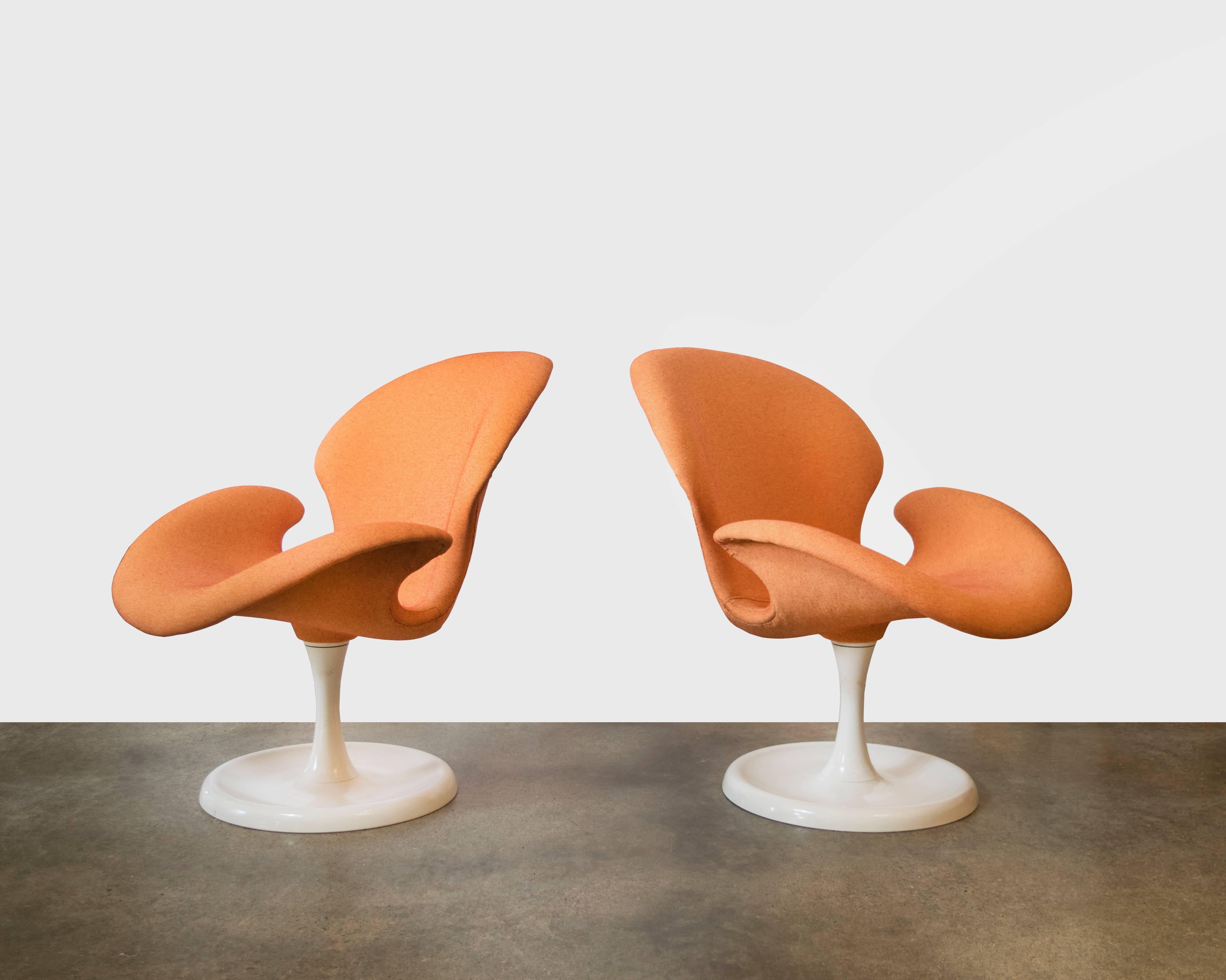 Rare set of four Danish Modern orchid chairs in the style of the Eero Saarinen swan chair but these are larger and more substantial. They also swivel and have been recently restored with new powder coating to the steel bases and new Knoll fabric and