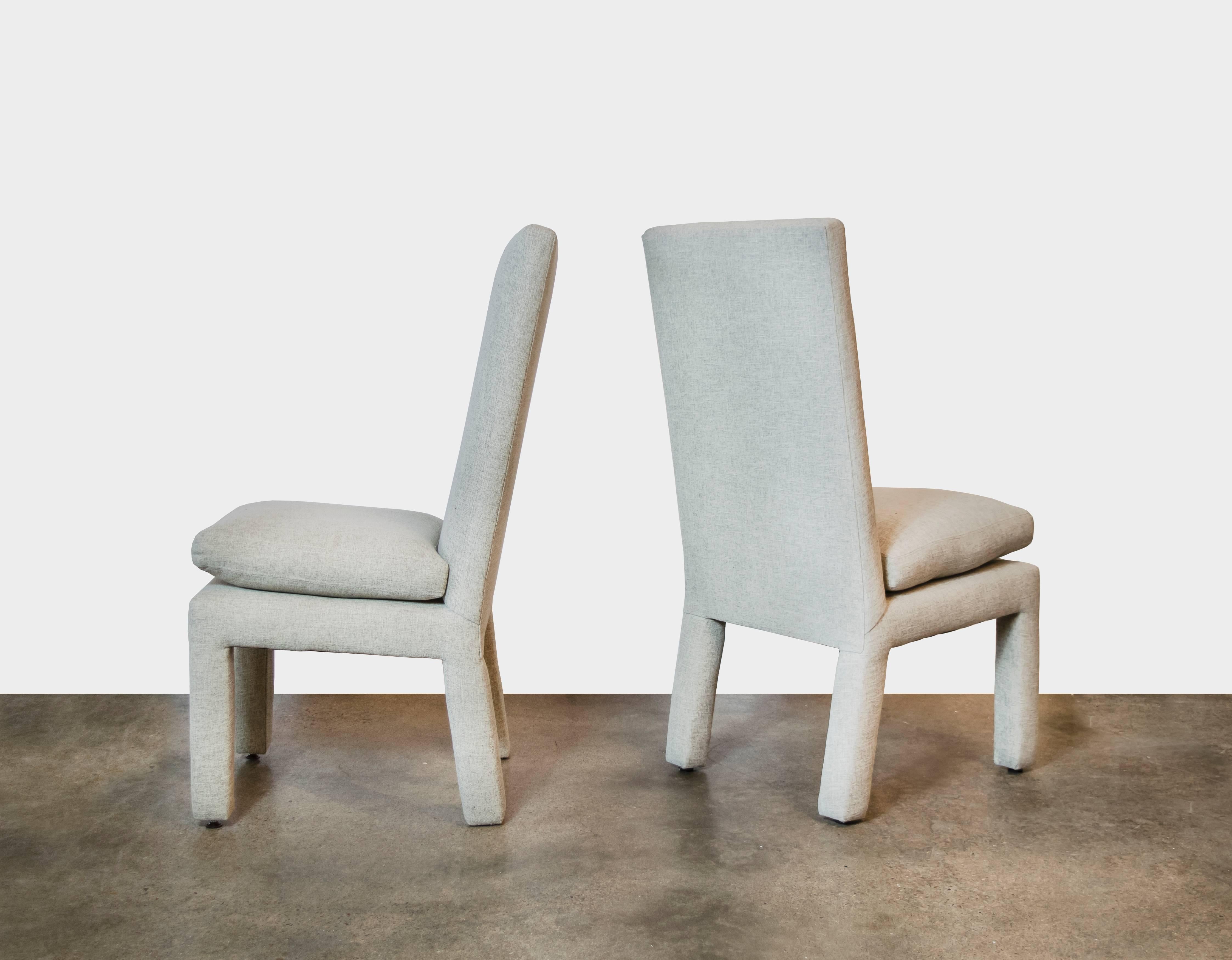 Set of six Classic Milo Baughman dining chairs, recently upholstered in an oatmeal linen wool blend. Exceptionally comfortable because of the high back and cushioned seating.