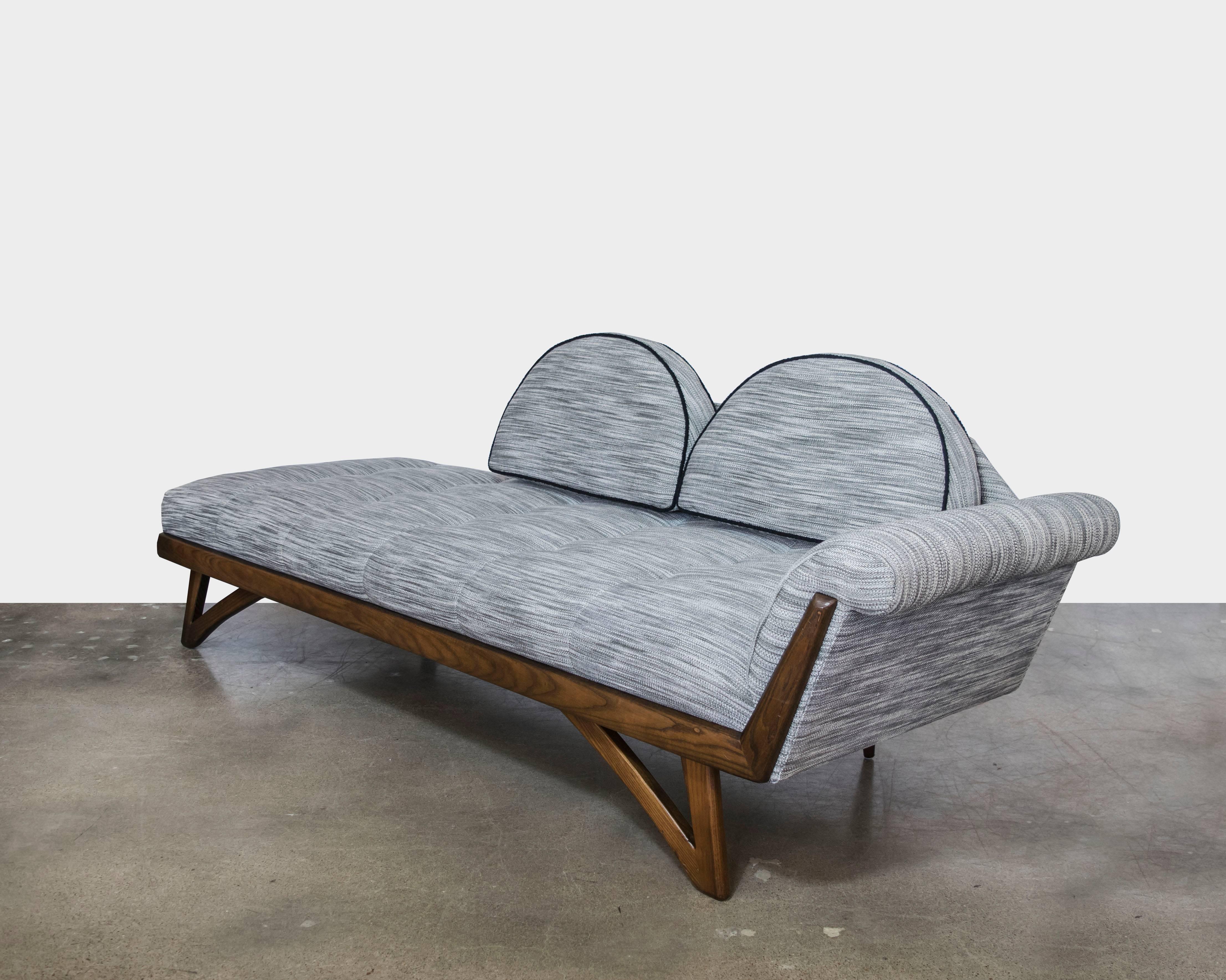 This is an interesting pair of chaise lounges that can be used as mirror opposites in a room for watching television or placed end to end as one very long sofa or placed in an L shape. They are extremely versatile and have recently been upholstered