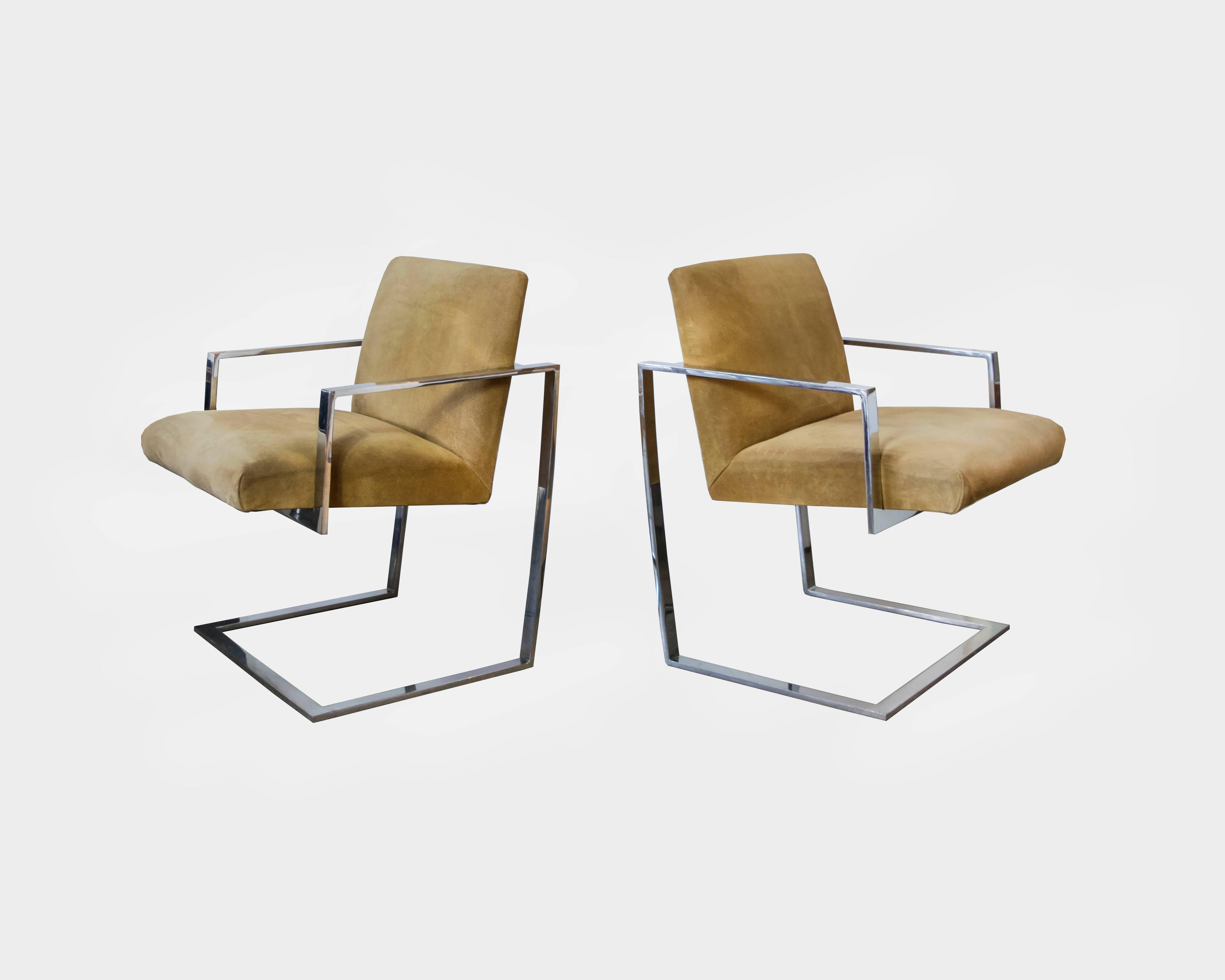 These chairs are astonishingly good looking. We've never seen another pair quite like them. They also have a slight rocking mechanism because of the cantilevered design. From any angle, these chairs are knockouts.