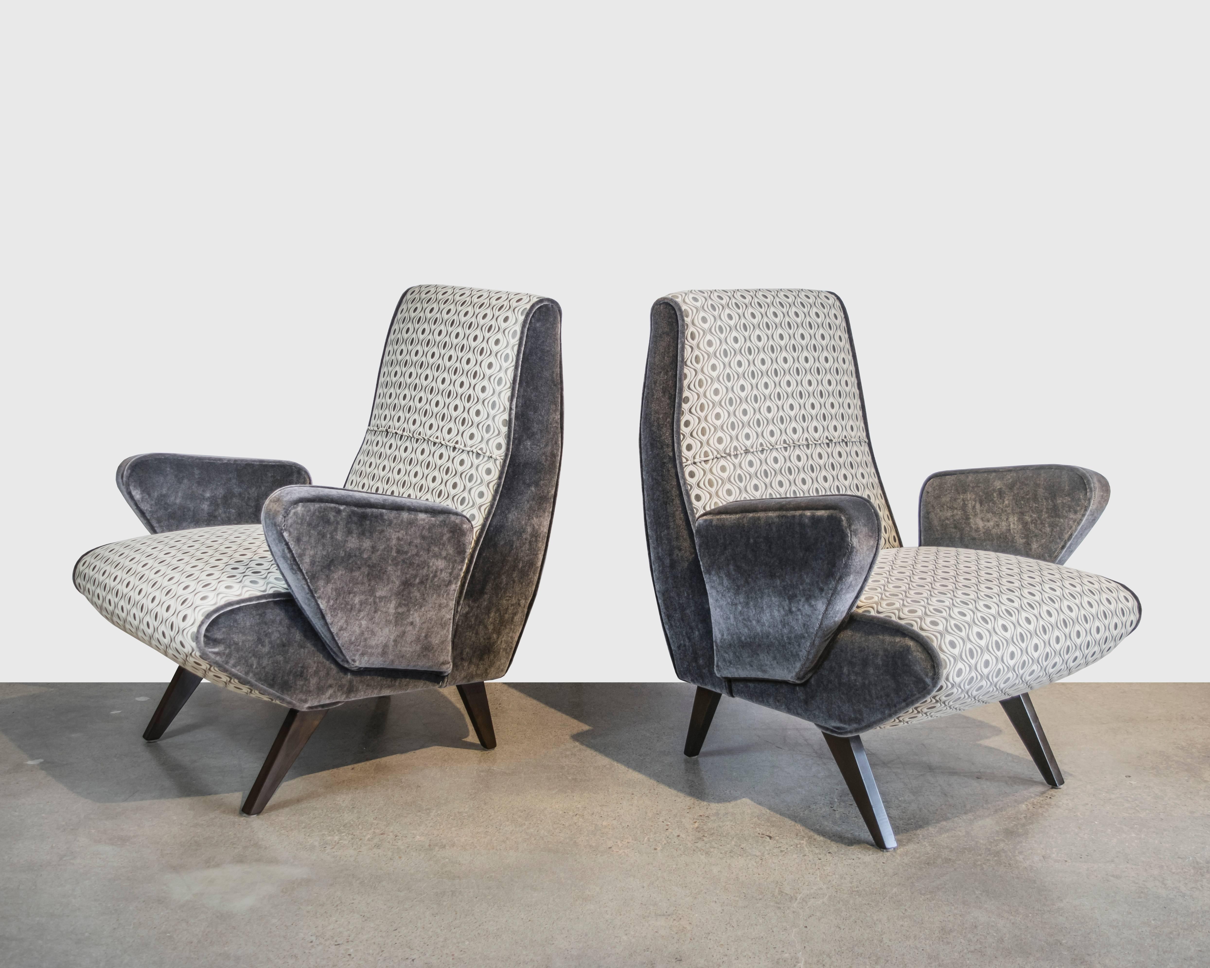 These are a pair of beautifully designed Italian Mid-Century armchairs with Donghia mohair surround and Pollack geometrical fabric on the seating. With ebonized wooden legs (matching settee available on a separate listing).