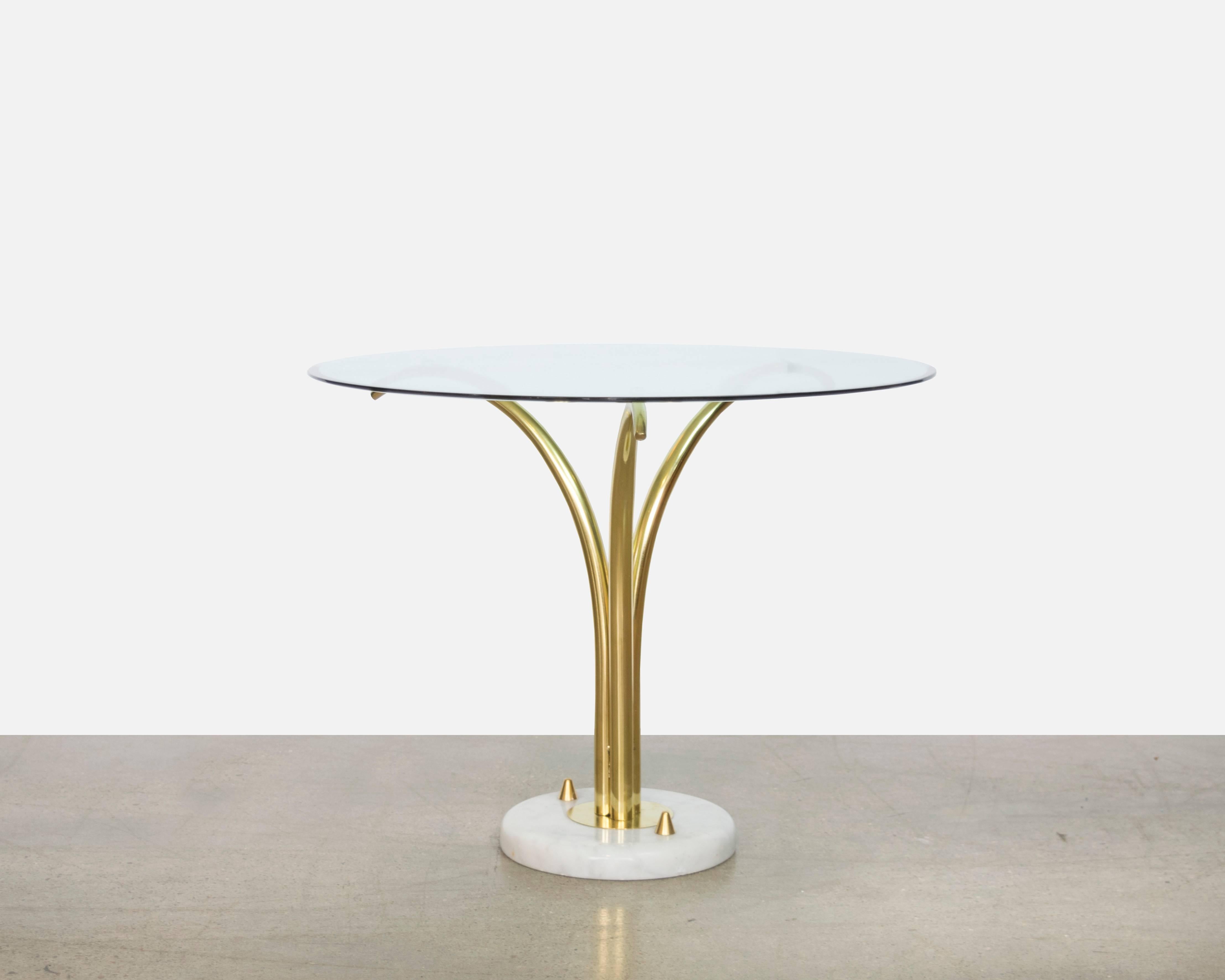 Beautiful Mid-Century French marble and brass three-pronged palm table with exquisite beveled glass top.