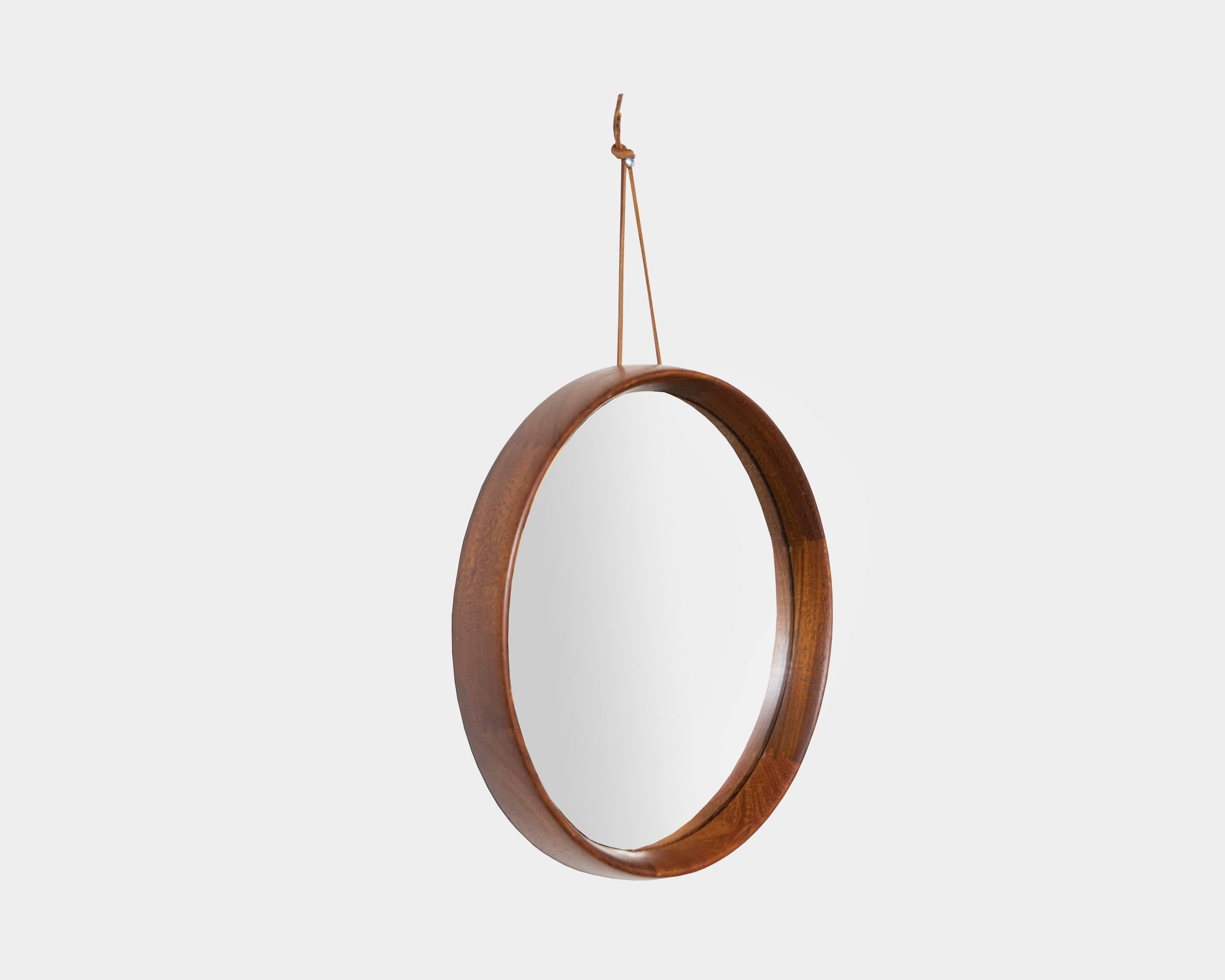 round mirror with leather hanging strap