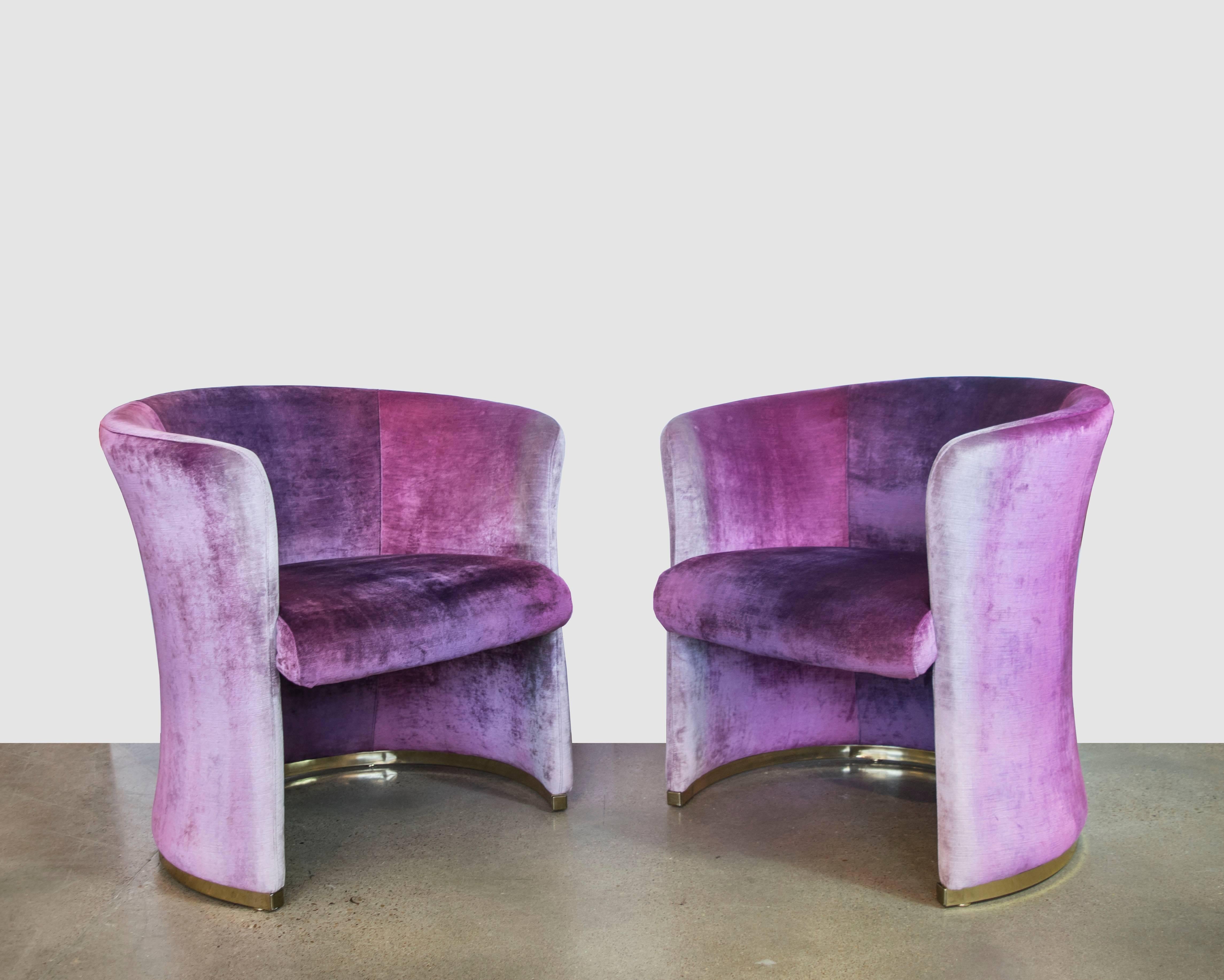 Pair of Milo Baughman for Thayer Coggin barrel club chairs with curved backs and exquisite ombre luxurious velvet which goes from a very pale lavender to a darker magenta. The chairs were expertly reupholstered and sit on a thin brass base.