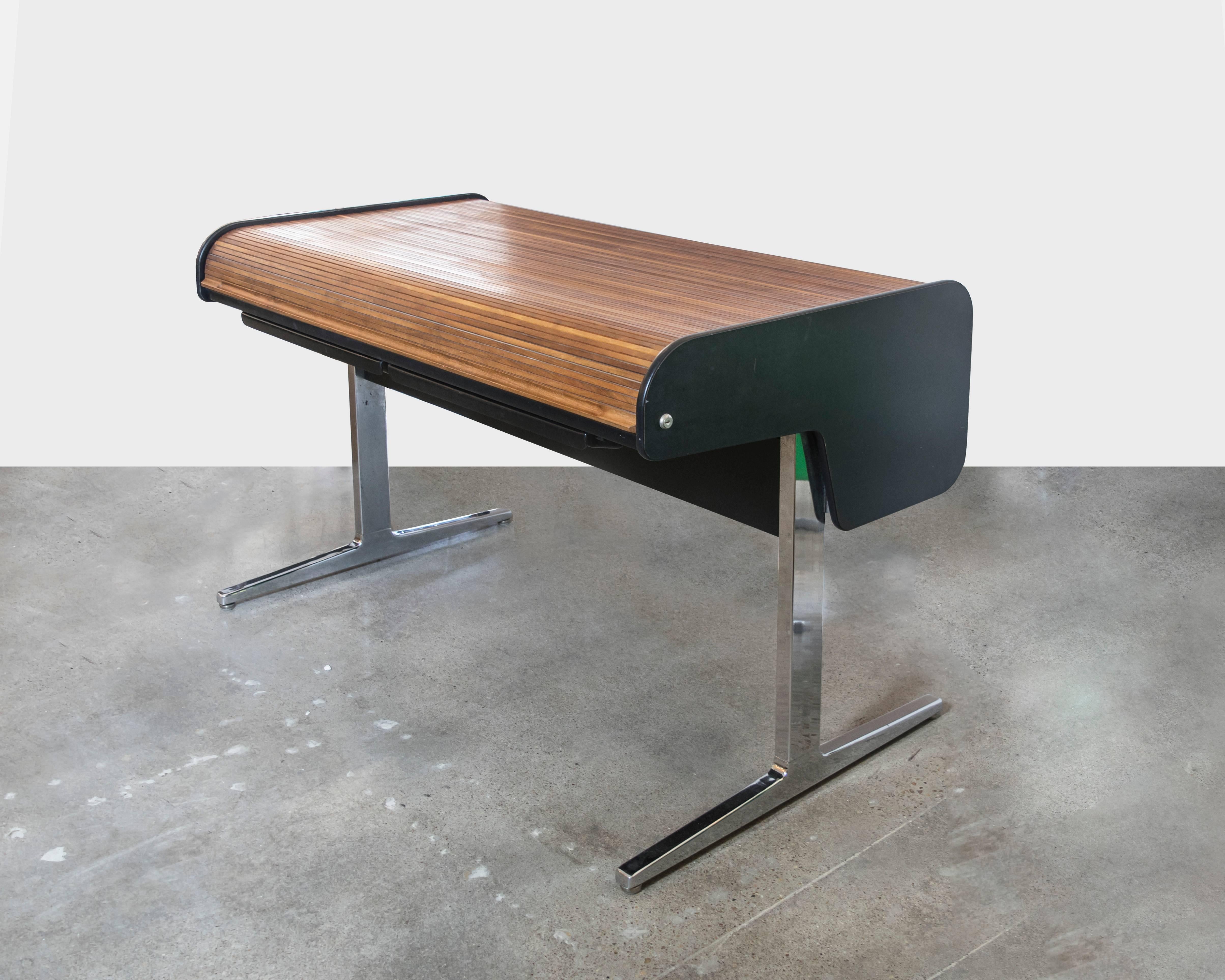 Executive "action office" desk designed by George Nelson for Herman Miller with an oak tambour roll up top and aluminum legs.
